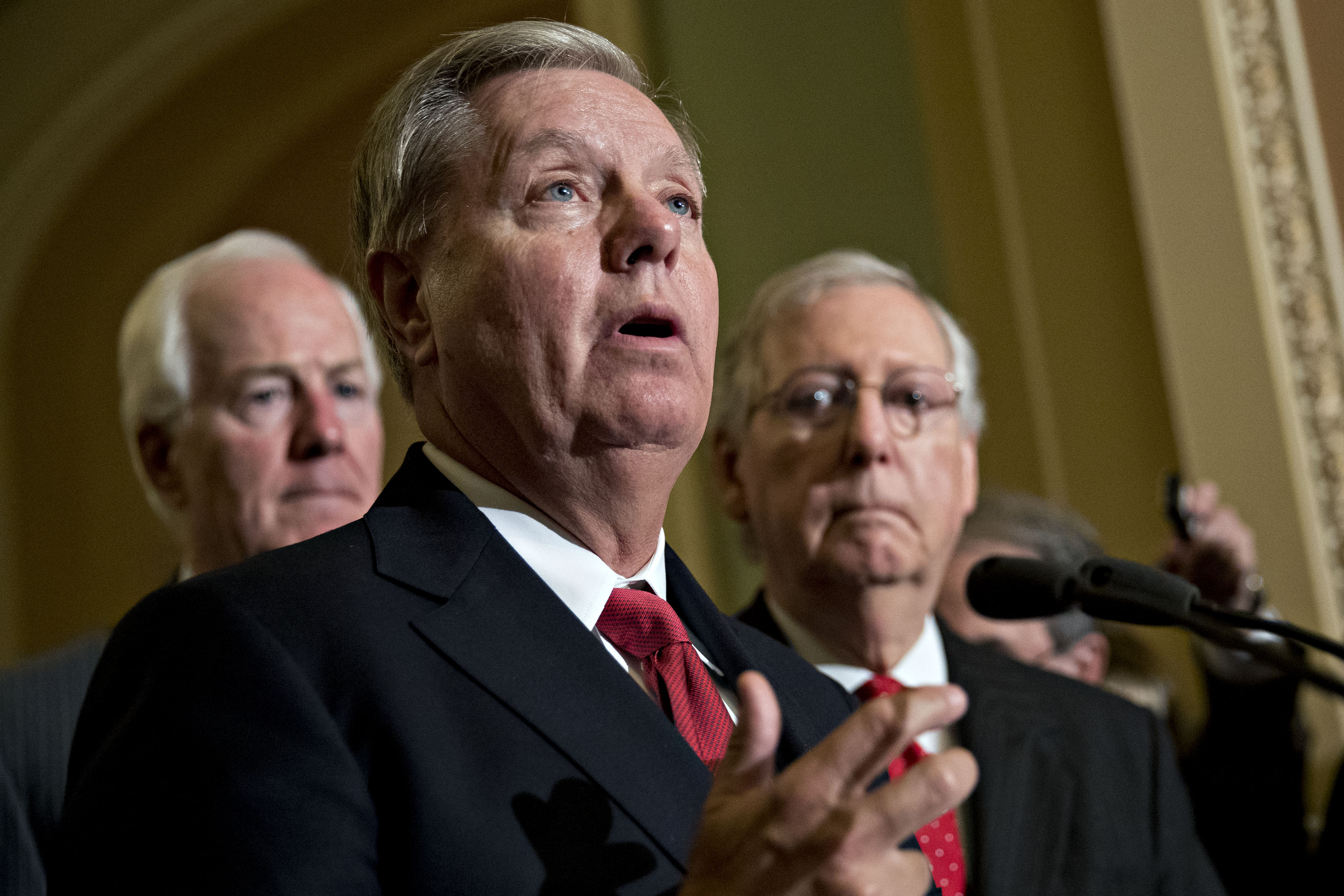 Senator Lindsey Graham, a Republican from South Carolina, speaks as Senate Majority Leader Mitch McConnell, a Republican from Kentucky, right, listens during a news conference after a Republican policy meeting luncheon at the U.S. Capitol. (Bloomberg&mdash;Bloomberg via Getty Images)