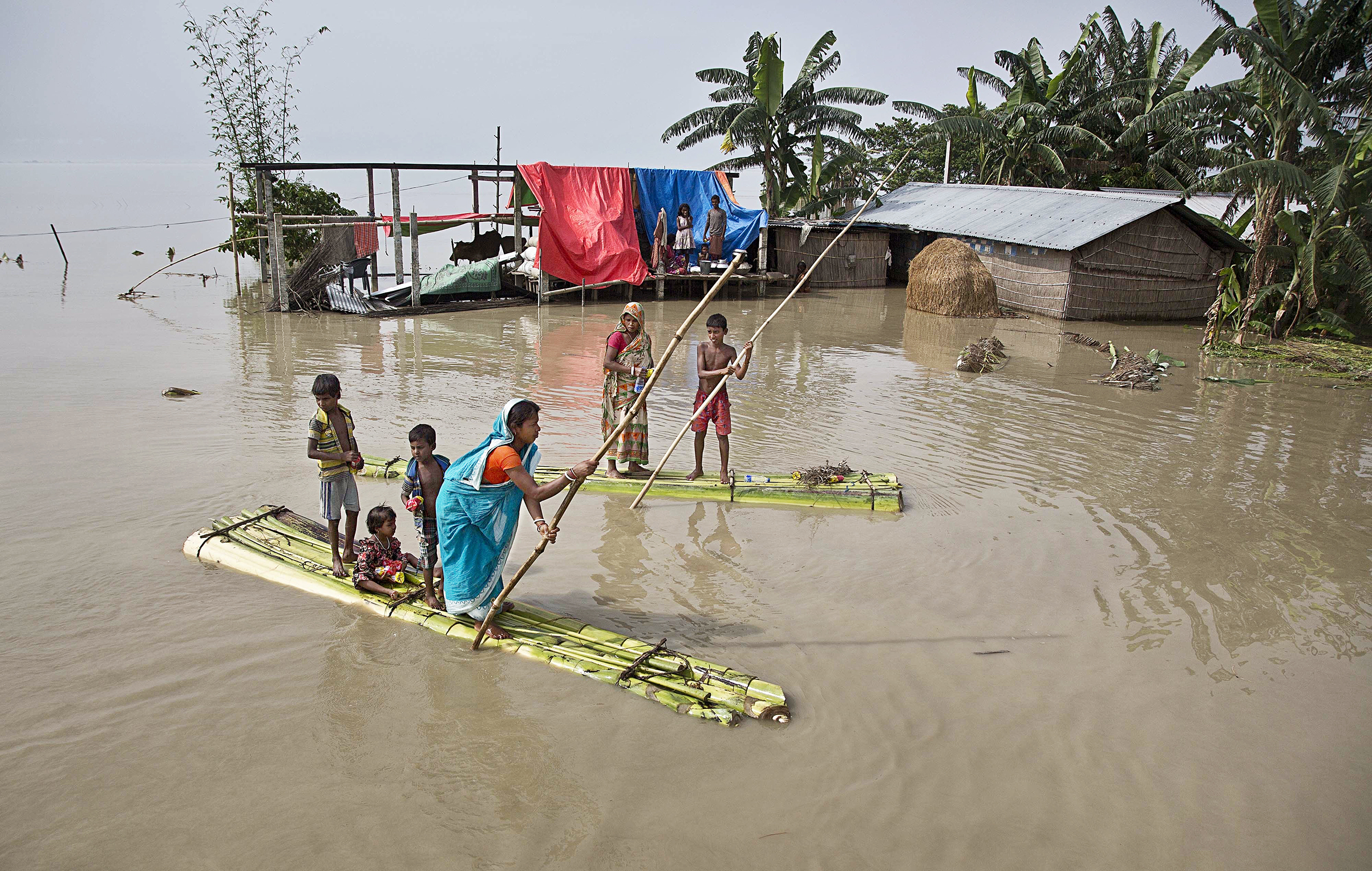 The Brahmaputra River gets severely flooded during monsoon season every year. (Anupam Nath—AP)
