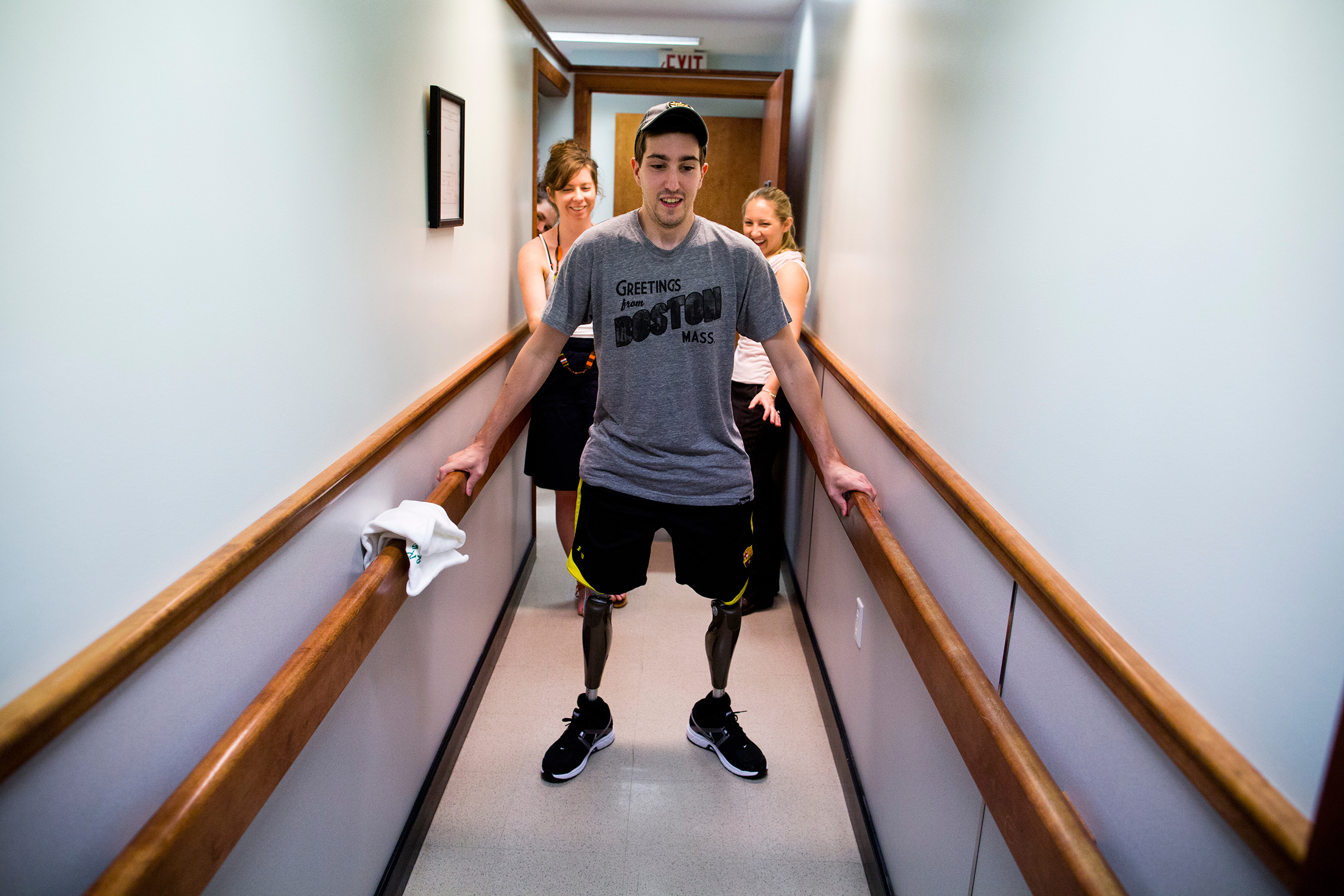 Bauman walks on his own for the first time since the marathon at a final fitting for his prosthetic legs in Massachusetts on May 31, 2013. (Josh Haner—The New York Times/Redux)