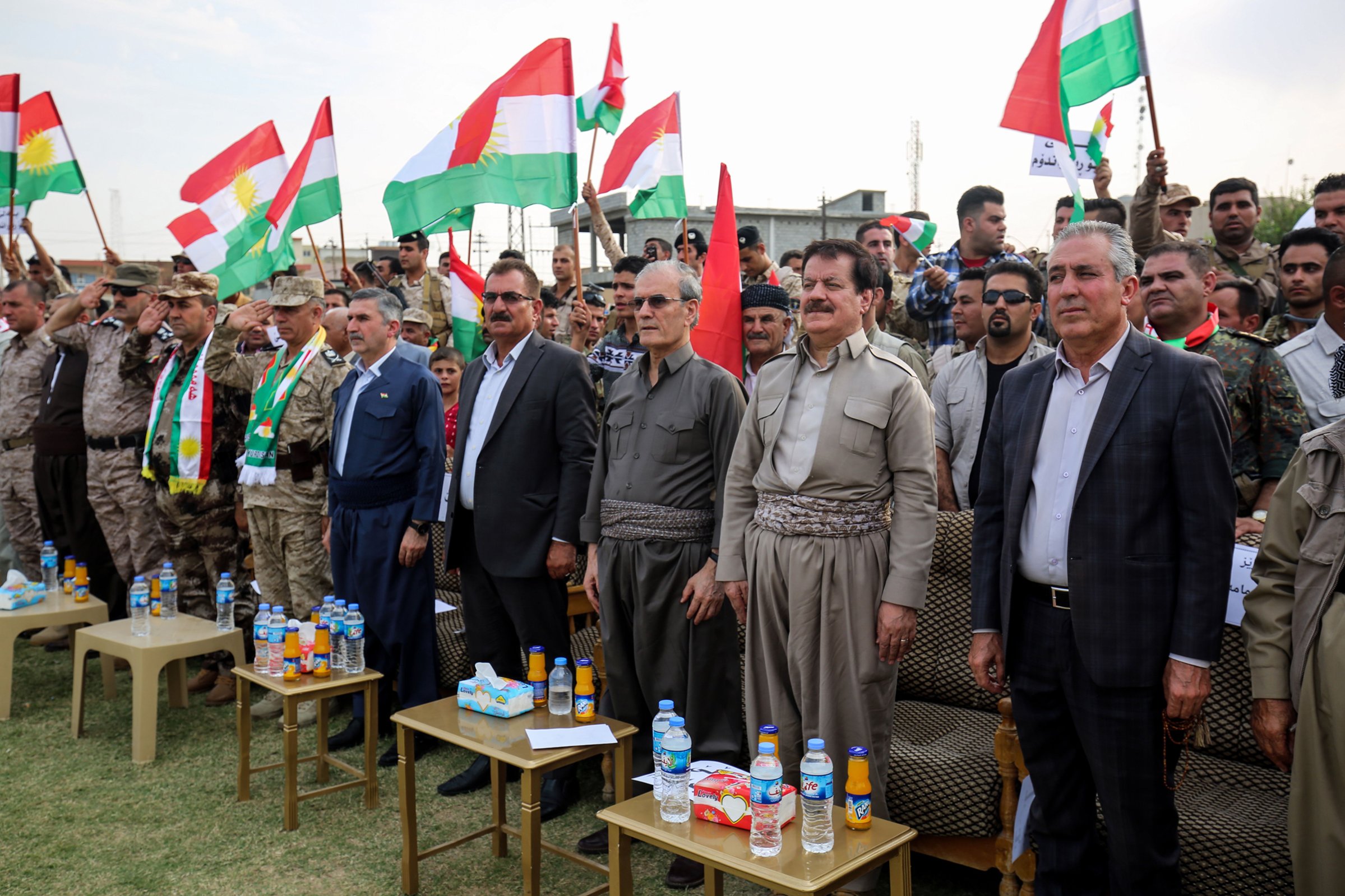 Kirkuk's provincial governor Najim al-Din Karim third from right, who was recently sacked by the Iraqi parliament, attends a rally in support of the upcoming independence referendum in Kirkuk on Sept. 19, 2017