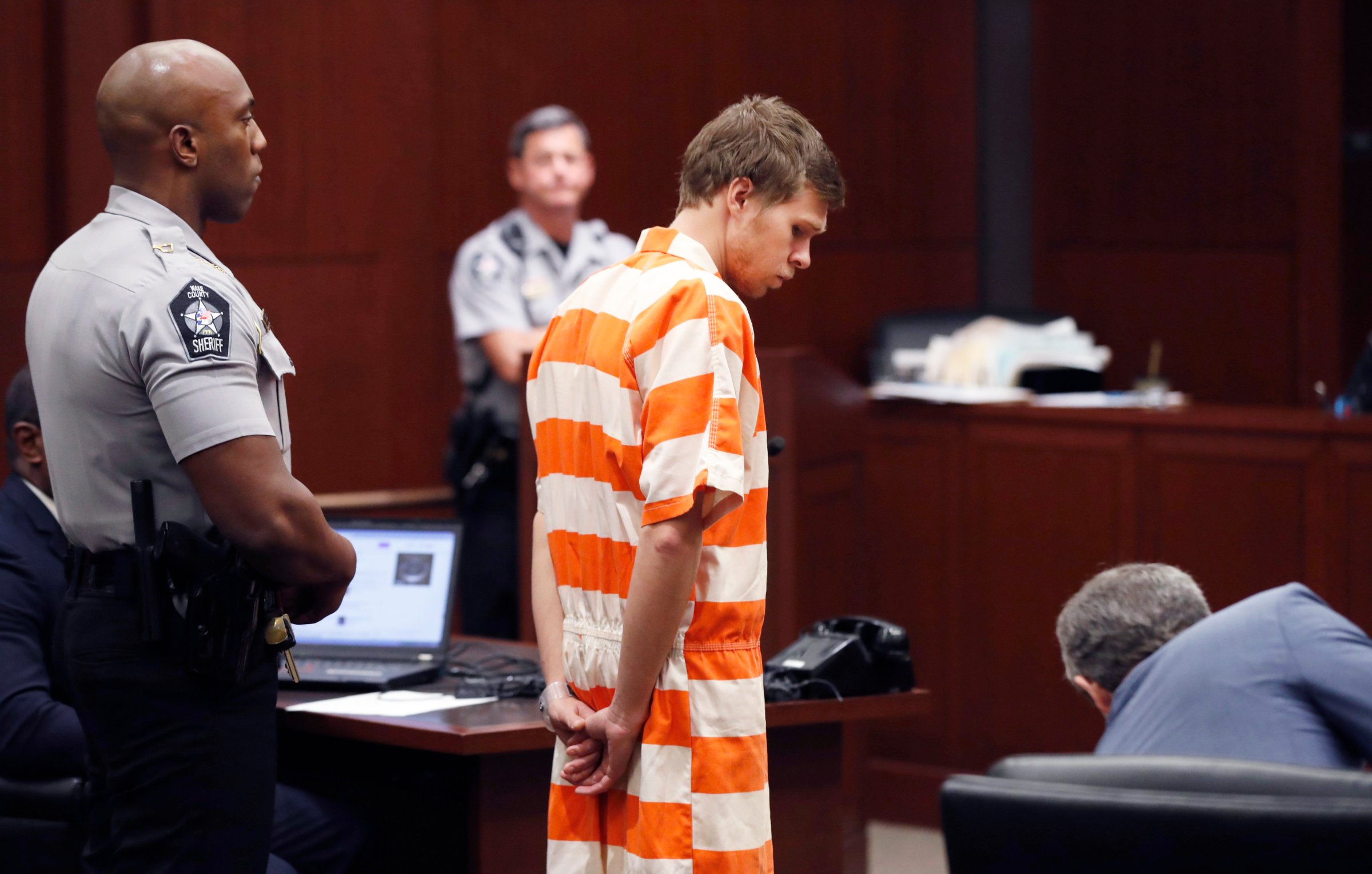 Matthew Phelps stands in the courtroom during his first appearance Tuesday, Sept. 5, 2017, in Raleigh, N.C. Phelps is charged in the death of his wife, Lauren Ashley-Nicole Phelps.