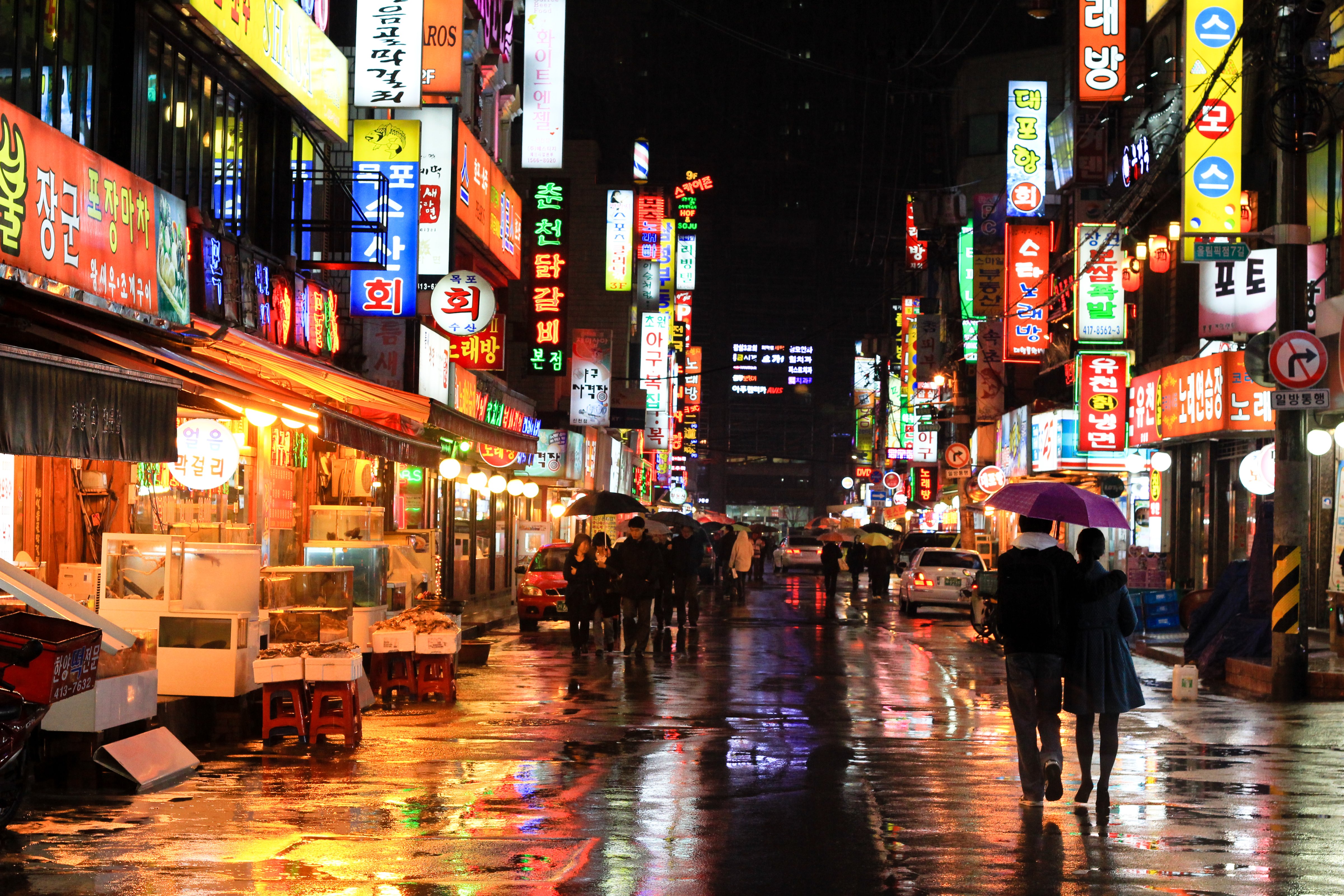 Colorful neon reflections of wet Seoul street taken at night at rain in Korea, Asia. (Alex Barlow&mdash;Getty Images)
