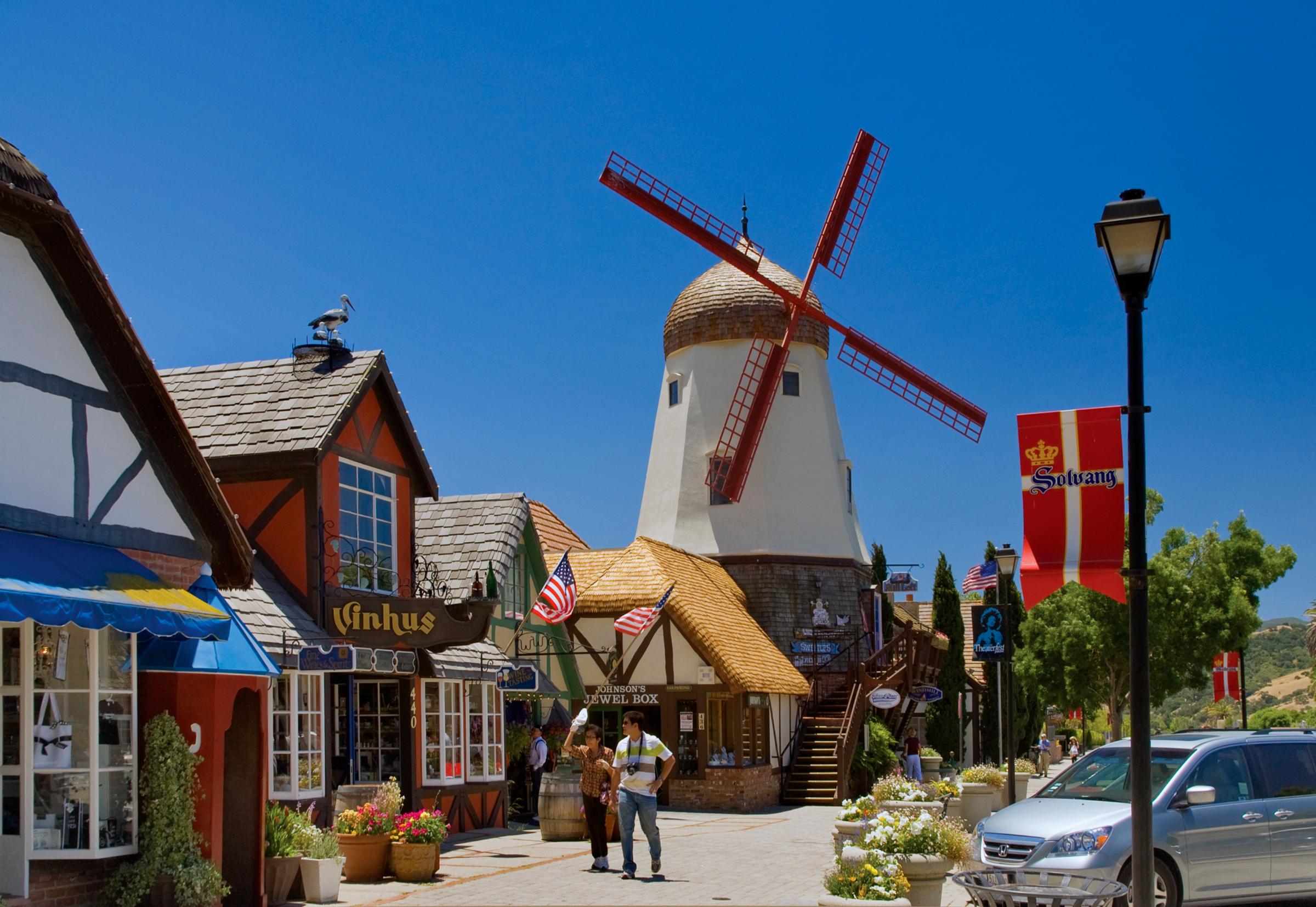 Windmill imitation and shops along Alisol Road in Danish Village.