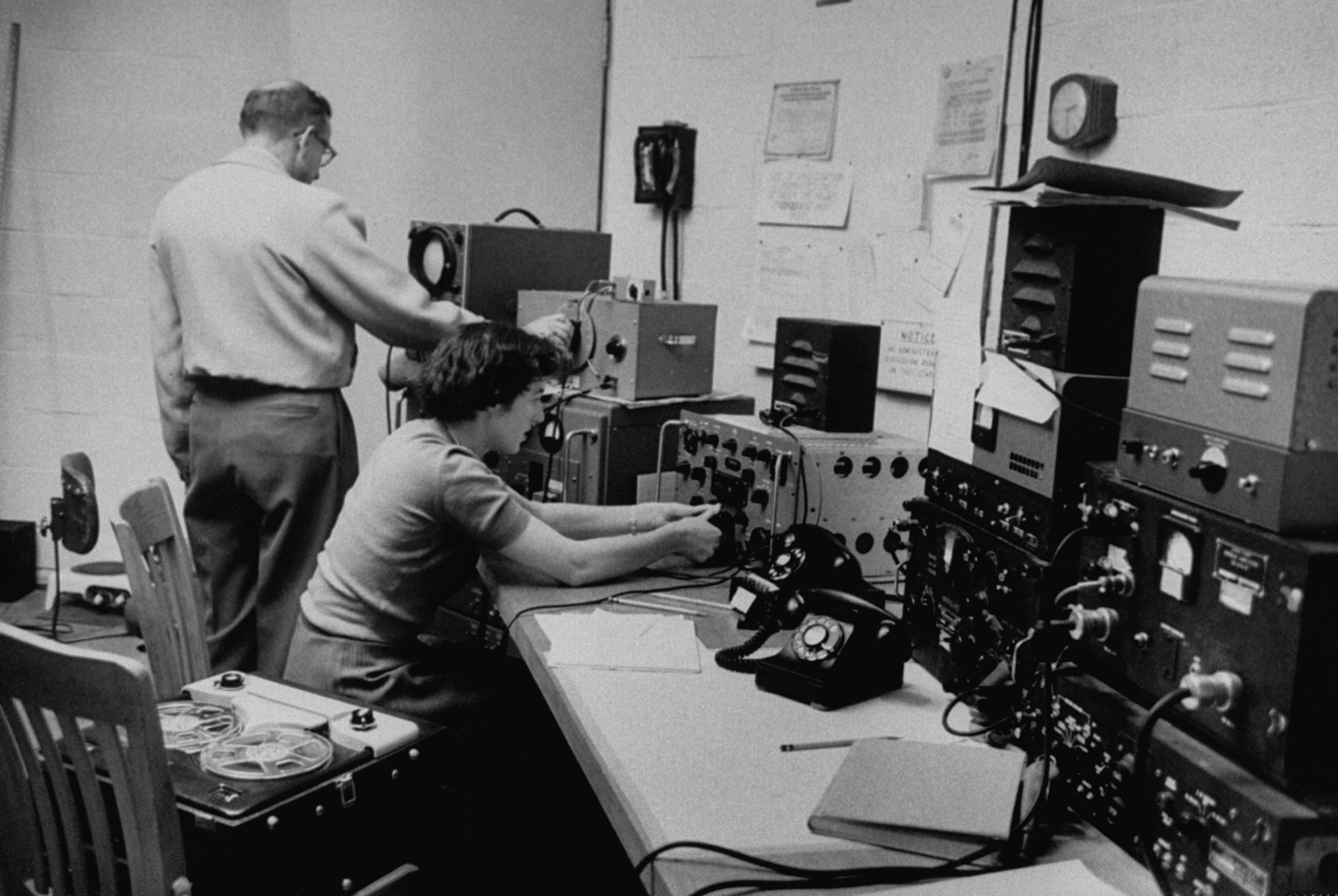 Scientists of the National Bureau of Standards Boulder Laboratory listening to signals from Sputnik I.