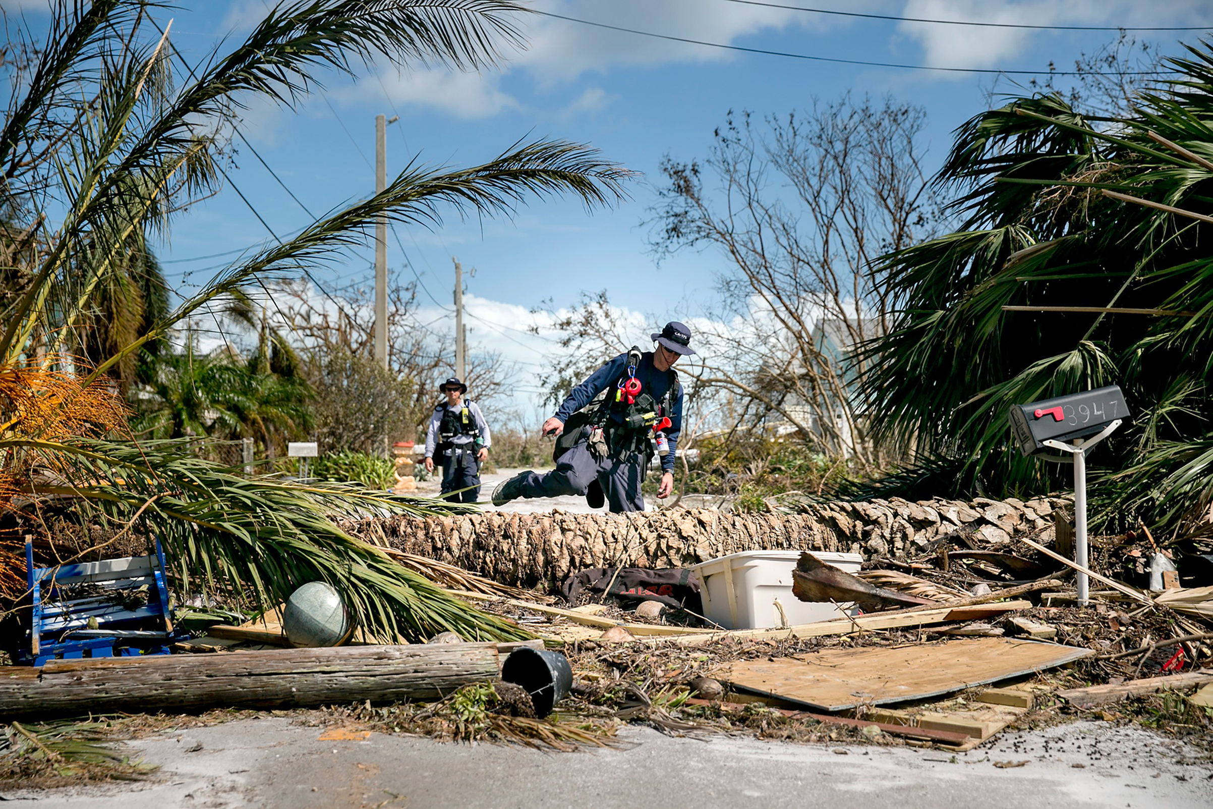 FEMA search-and-rescue teams at work in a neighborhood in Big Pine Key. The Keys were hit especially hard (Sam Hodgson—The New York Times)