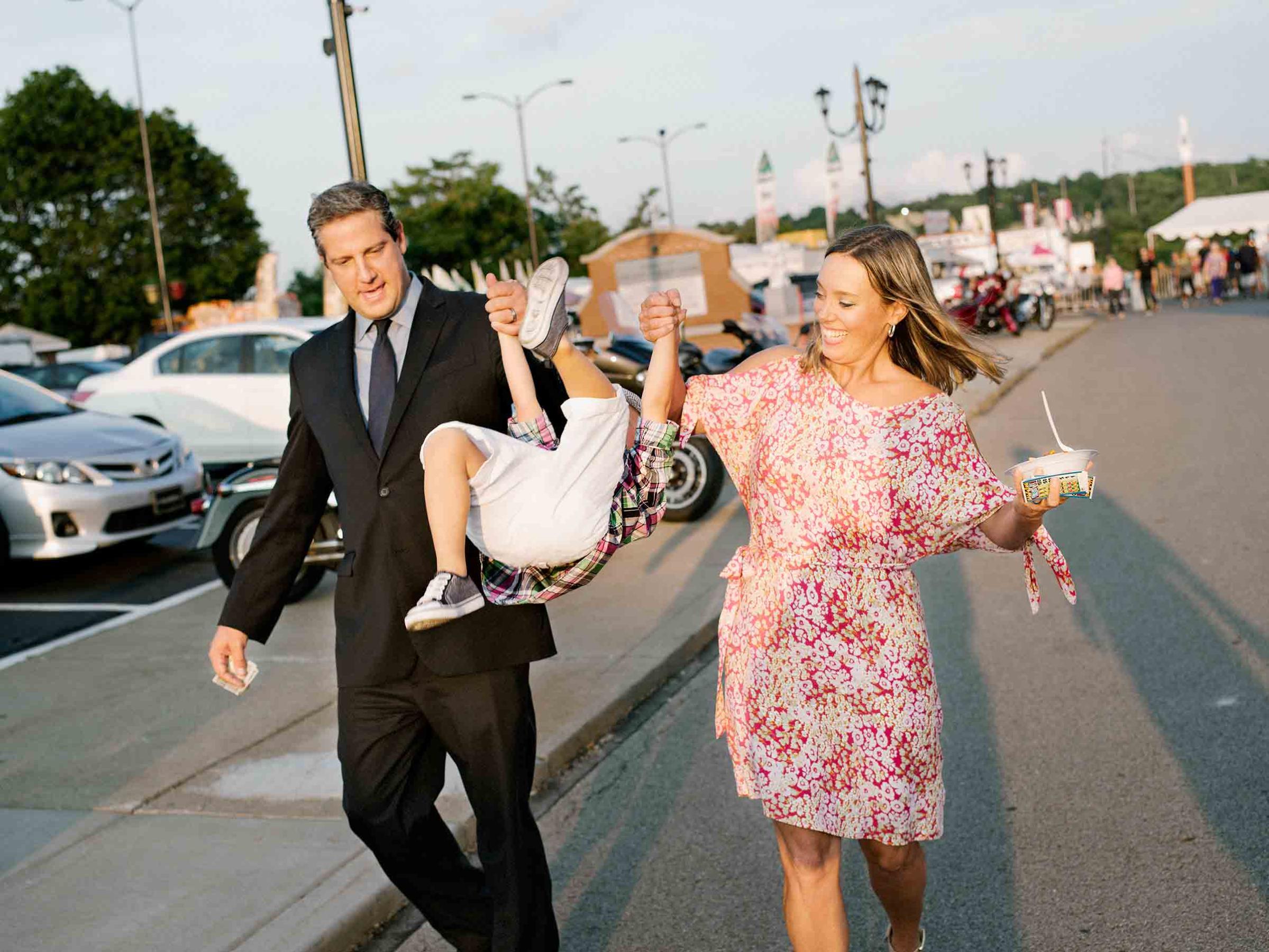 Ryan, with wife Andrea and son Brady, leaves an Italian festival in Youngstown, Ohio, on July 21