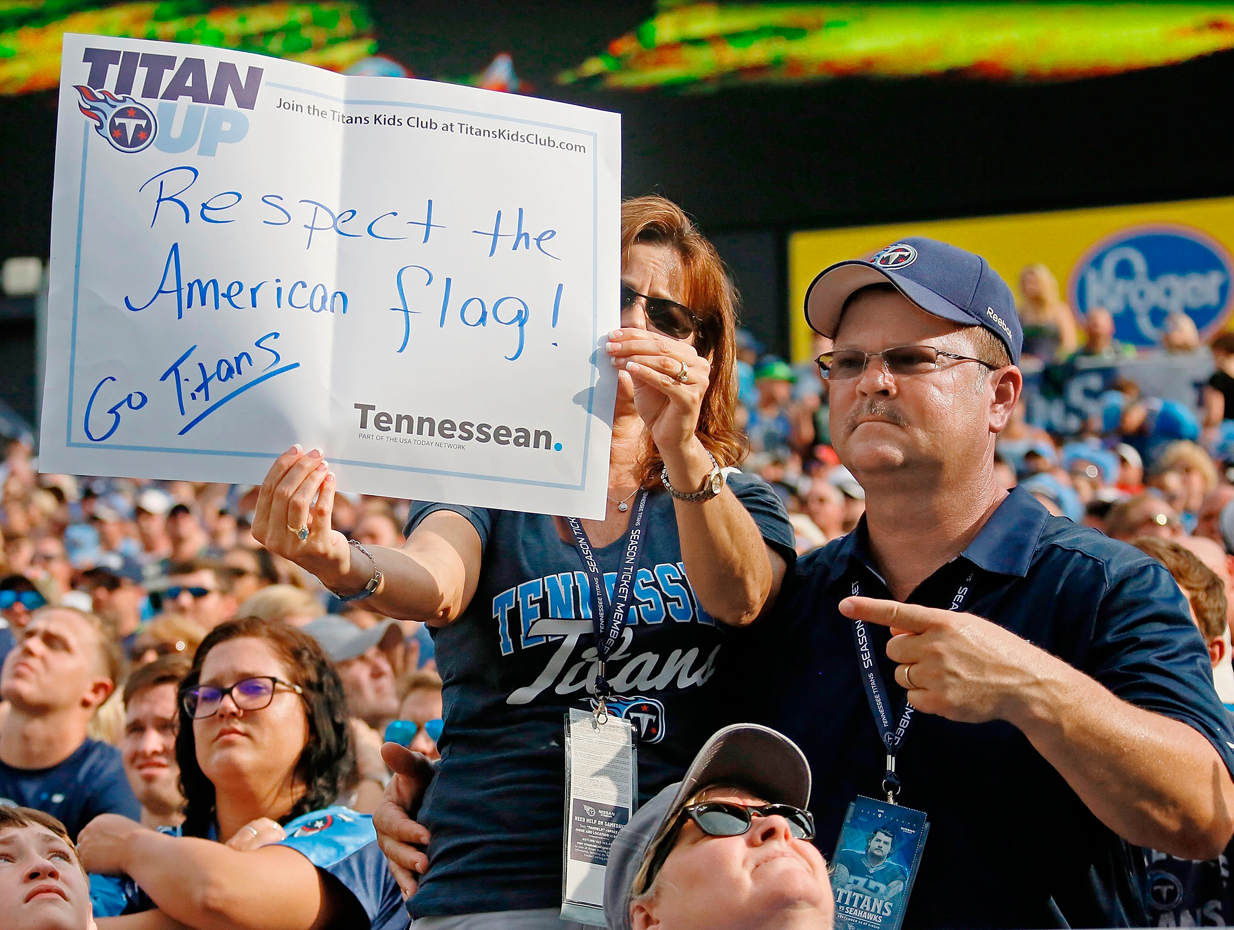 A Tennessee Titans fan hoists a sign during a game against the Seattle Seahawks in Nashville on Sept. 24 (Frederick Breedon—Getty Images)