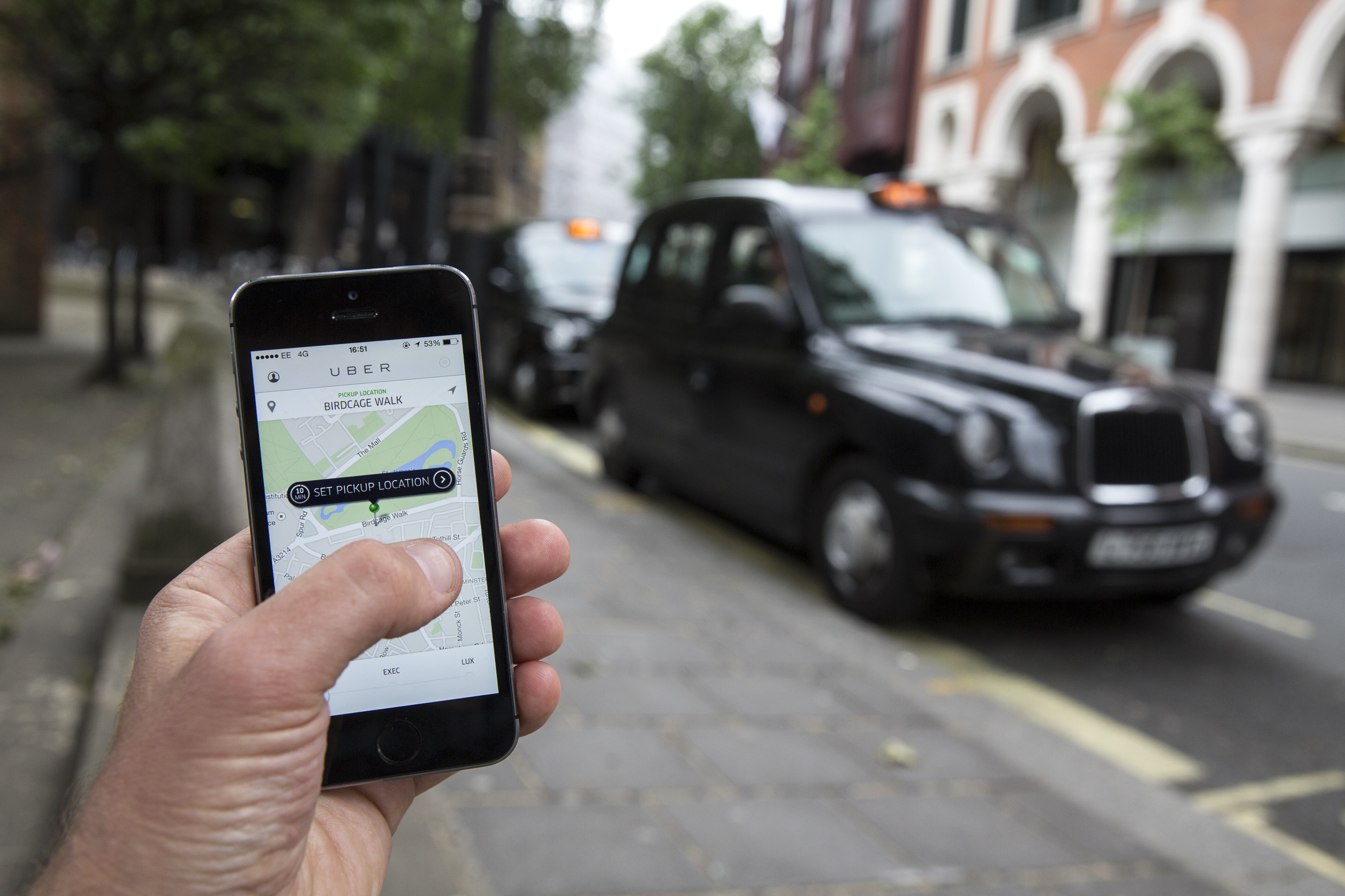 In this photo illustration, a smartphone displays the 'Uber' mobile application which allows users to hail private-hire cars from any location on June 2, 2014 in London, England. (Photo by Oli Scarff/Getty Images) (Oli Scarff&mdash;Getty Images)