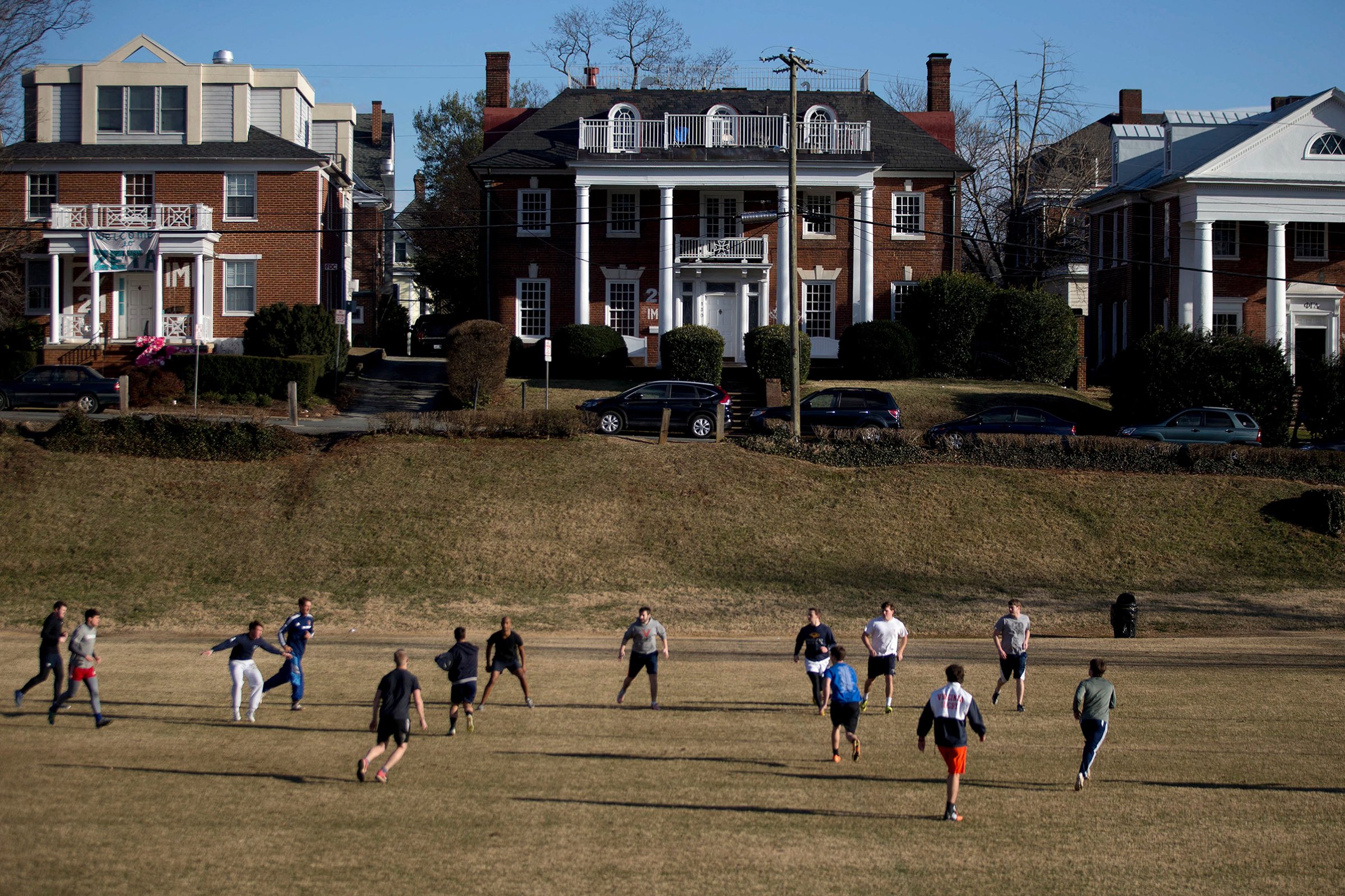 Students play rugby on the Madison Bowl field of the University of Virginia (UVA) campus next to fraternity houses on Madison Lane in Charlottesville, Virginia, Jan. 16, 2015.