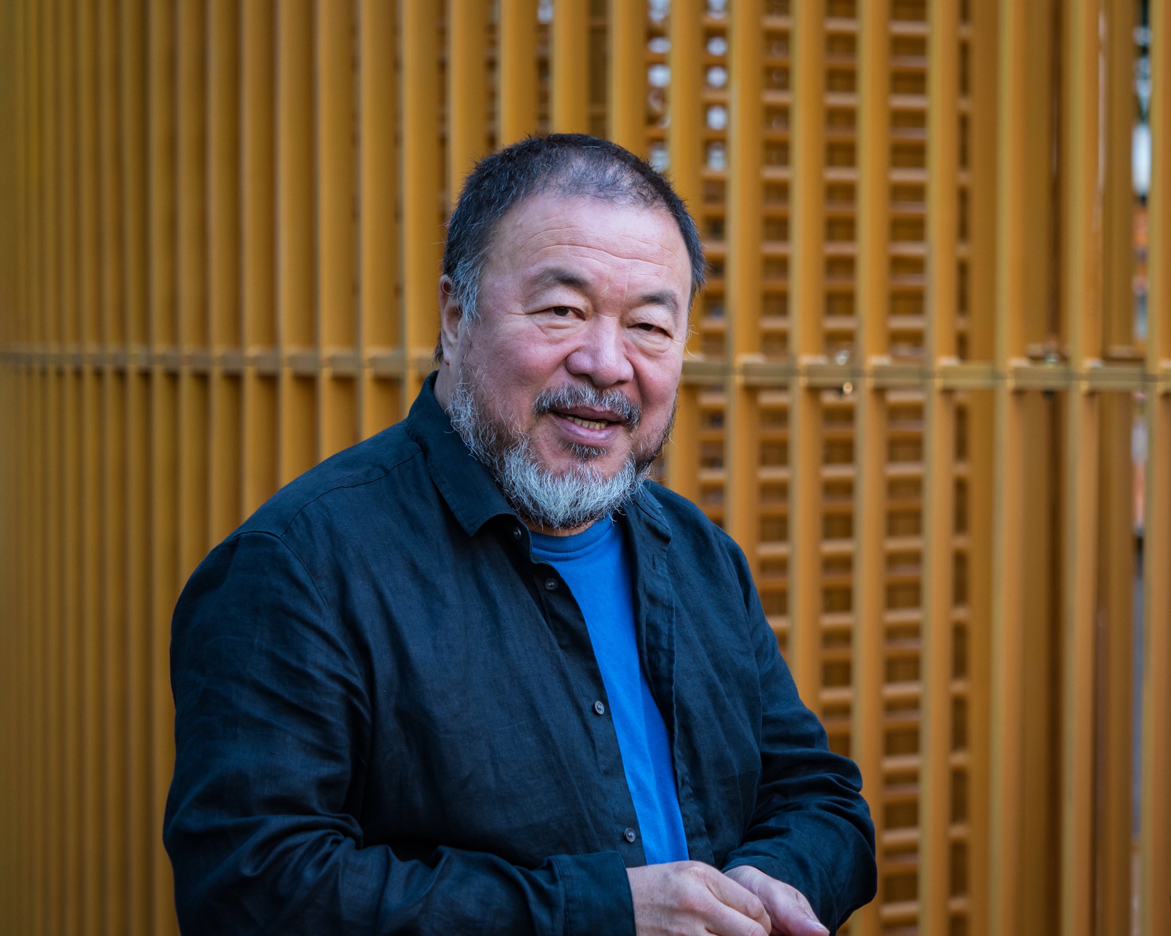 Chinese contemporary artist and activist Ai Weiwei attends the news conference for his instillation 'Good Fences Make Good Neighbors,' in Manhattan on Oct. 10, 2017.