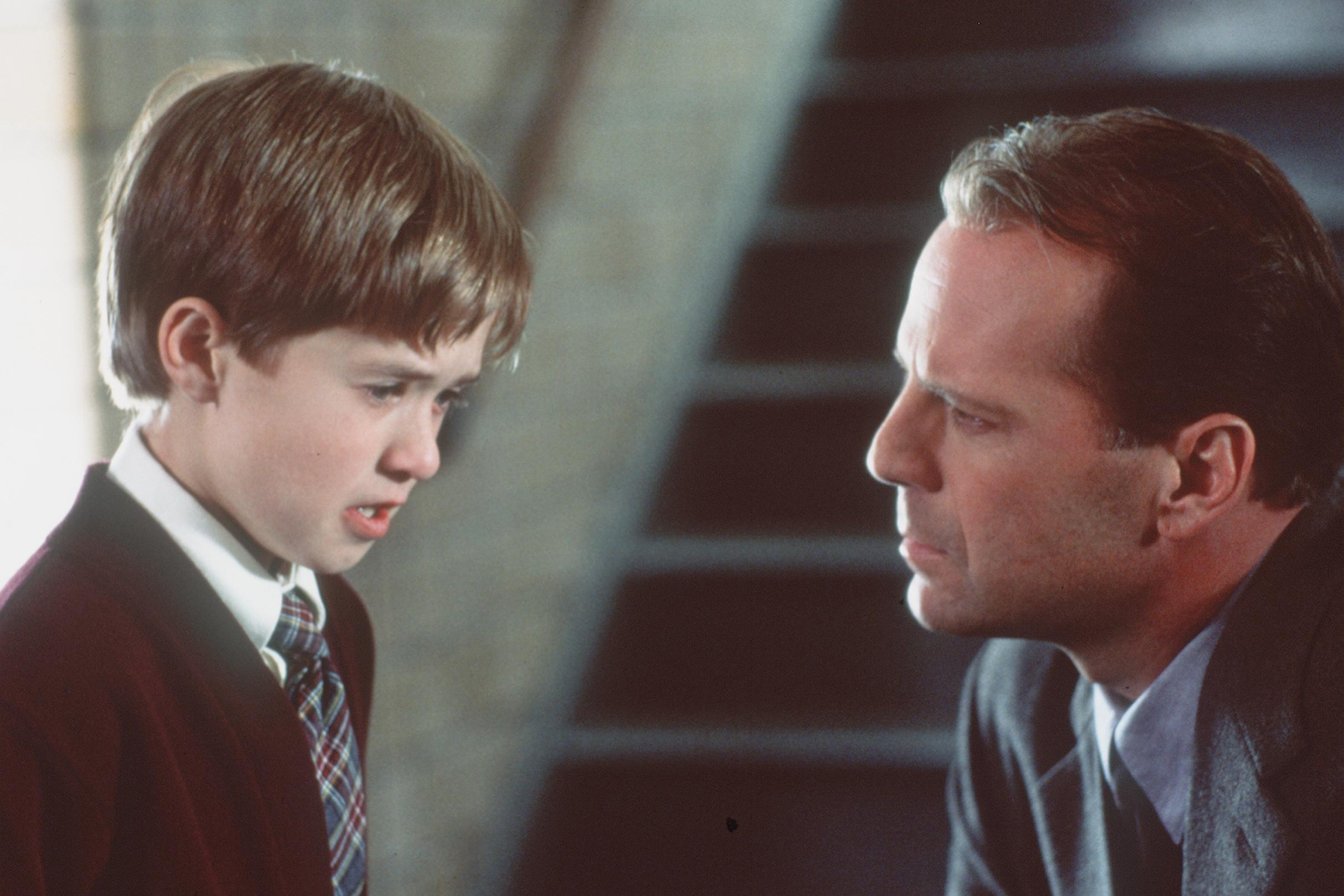 Bruce Willis and Haley Joel Osment in 'The Sixth Sense'. (Getty Images)