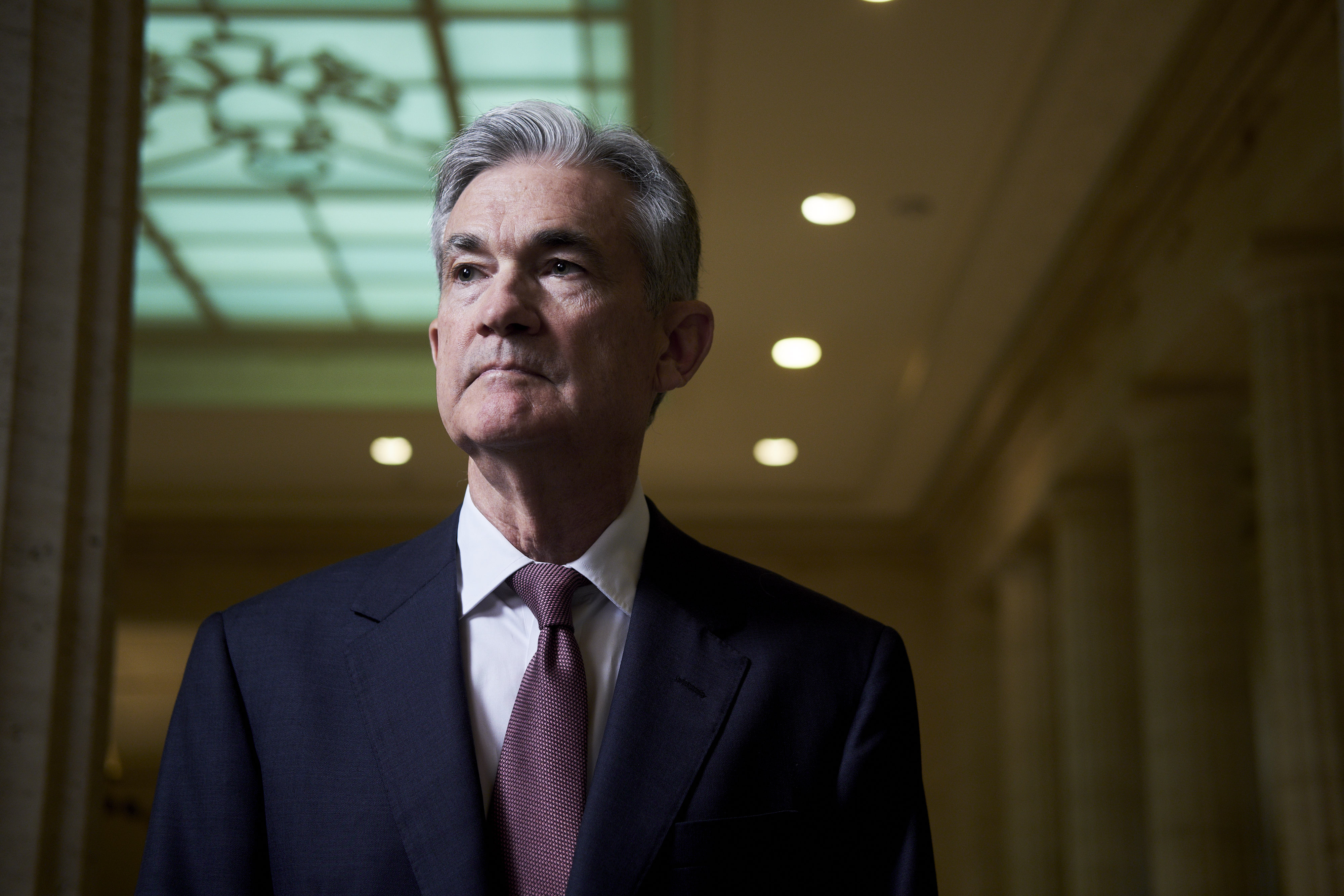 Jay Powell, governor of the U.S. Federal Reserve, stands for a photograph at the board's headquarters in Washington, D.C., on April 13, 2017. As the lone Republican on the Fed's seven-seat board and someone with in-depth knowledge of how the central bank works, Powell's influence looks set to increase as President Donald Trump prepares to fill three vacancies. (T.J. Kirkpatrick—Bloomberg/Getty Images)