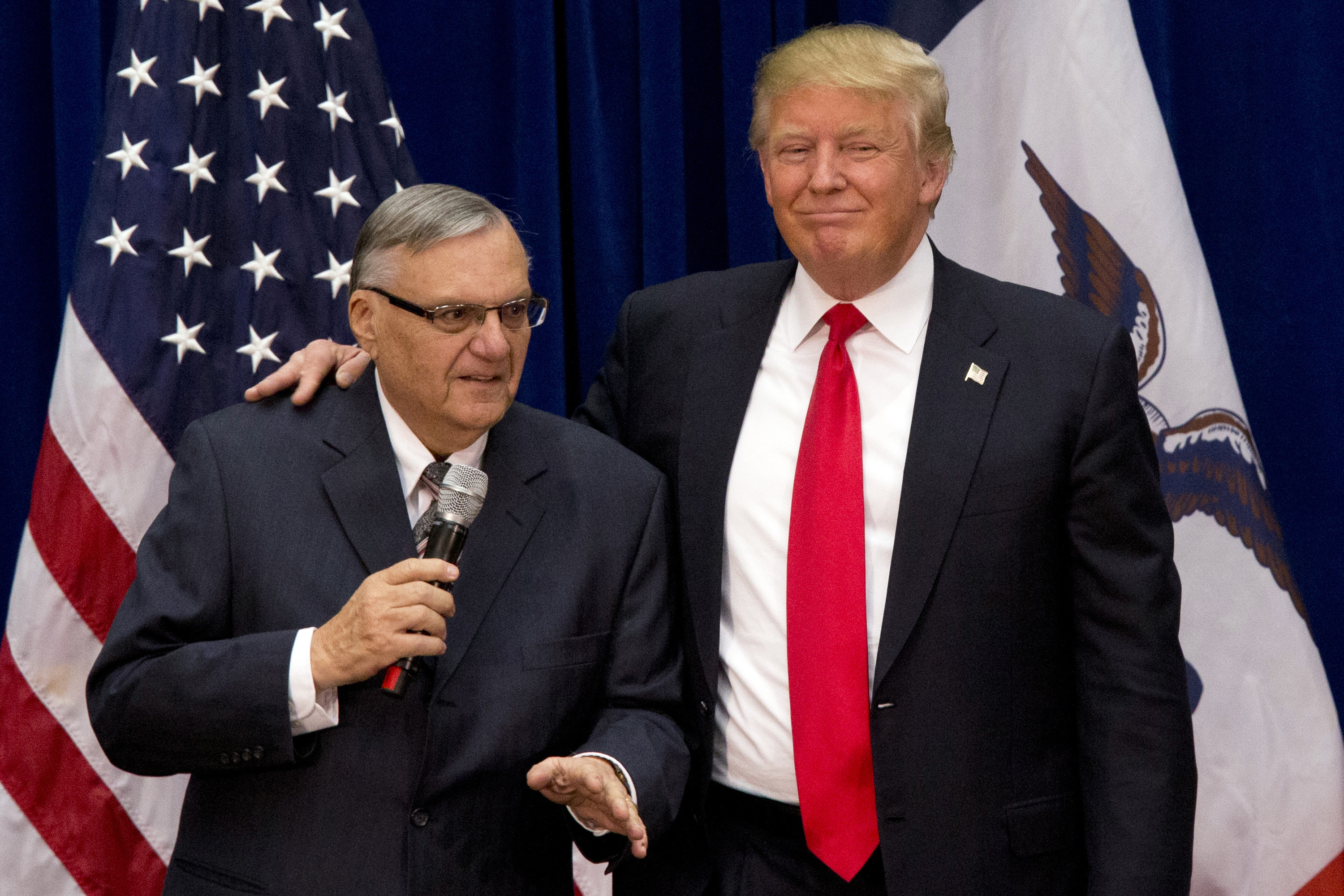 Republican presidential candidate Donald Trump is joined by Joe Arpaio, the sheriff of metro Phoenix, at a campaign event in Marshalltown, Iowa on Jan. 26, 2016. (Mary Altaffer&mdash;AP)