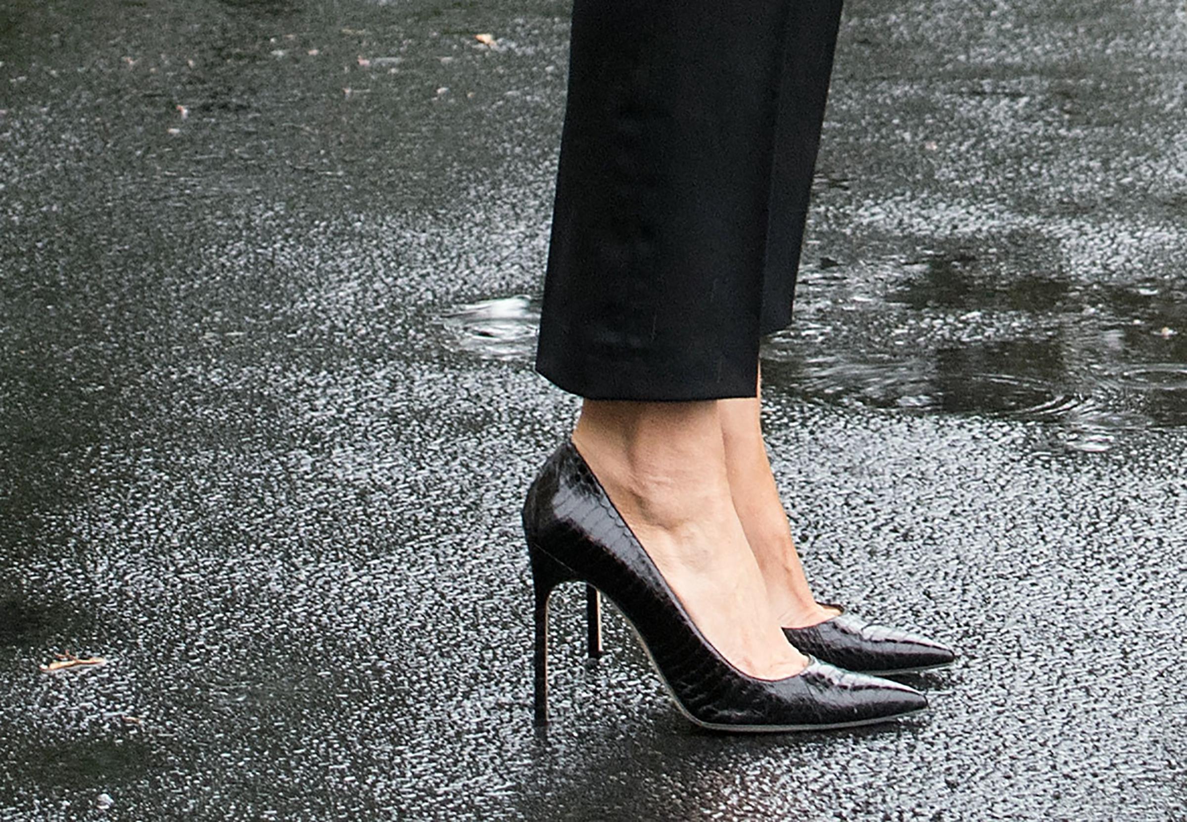 First lady Melania Trump wearing black Manolo Blahnik stilettos before leaving for Texas to observe the Hurricane Harvey relief efforts, Aug.29, 2017.