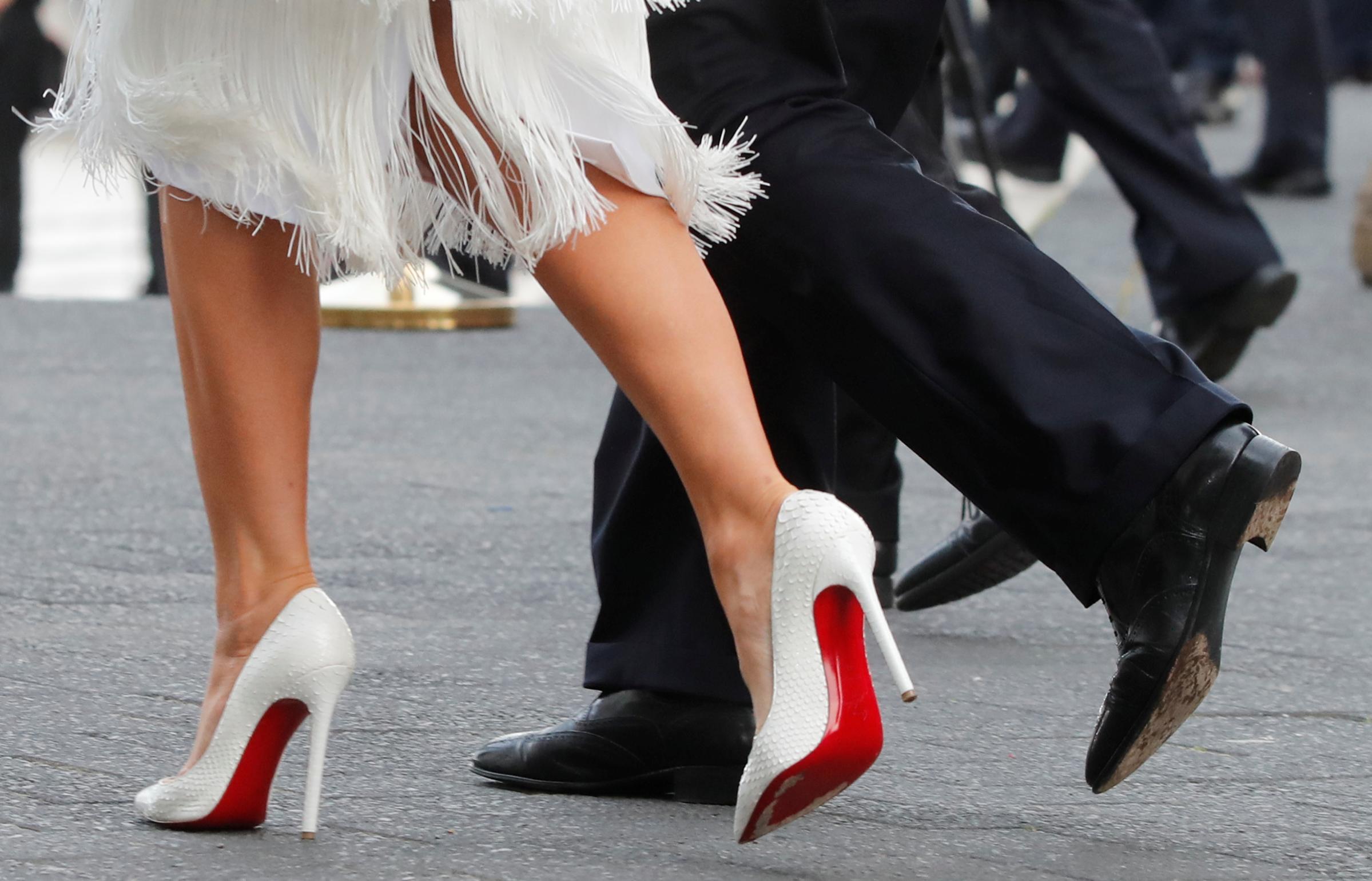 President Donald Trump and his wife Melania Trump wearing Christian Louboutin white stilettos , are seen at the G20 summit in Hamburg, Germany July 7, 2017.