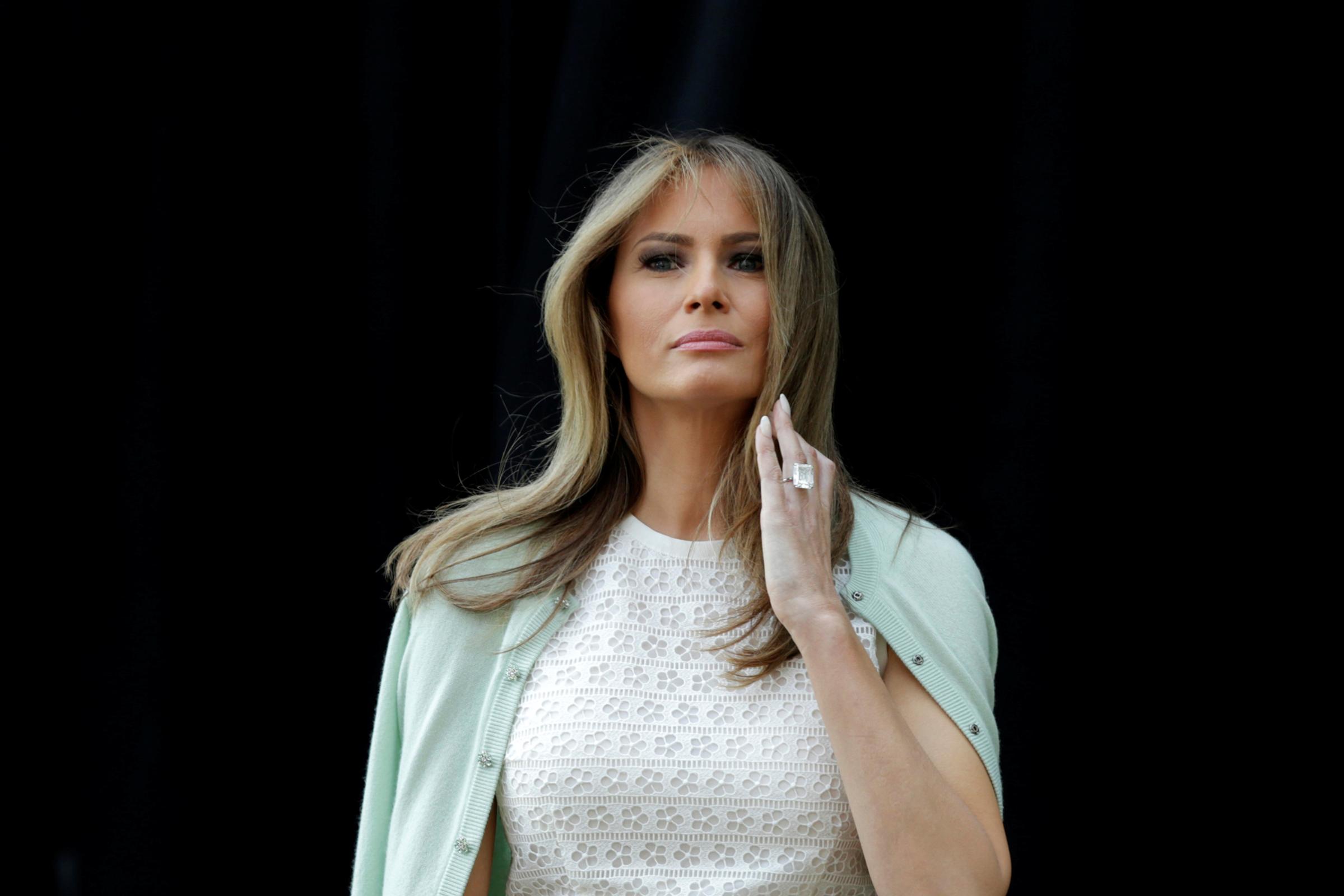 First lady Melania Trump wearing Giambattista Valli dress and a pale green cardigan, attends the opening of Bunny Mellon Healing Garden at Children's National Medical Center in Washington, D.C., April 28, 2017.