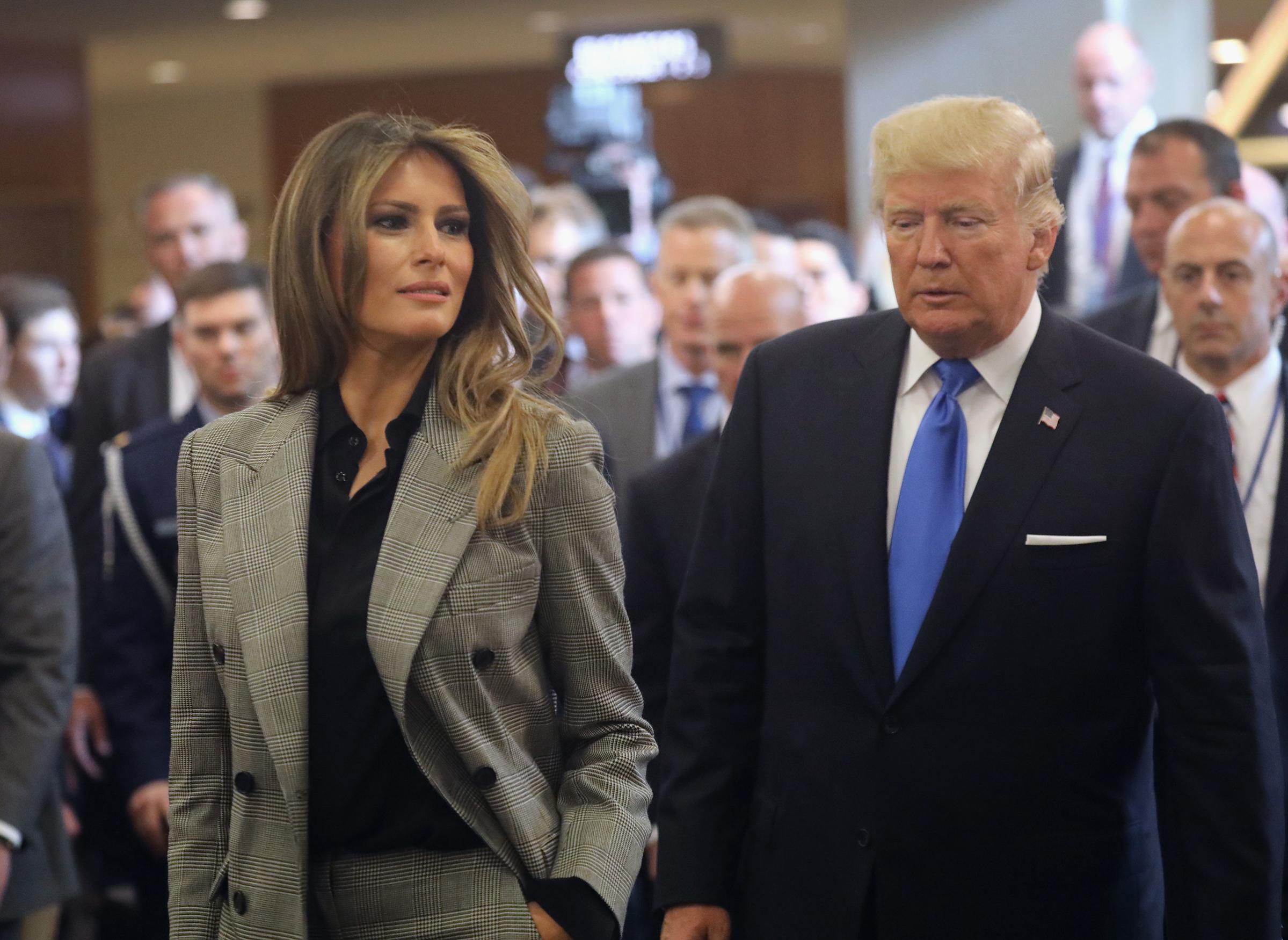 First lady Melania Trump wearing a pants suite by the Ralph Lauren Collection and President Donald Trump depart the United Nations after the president's speech on Sept. 19, 2017 in New York City.