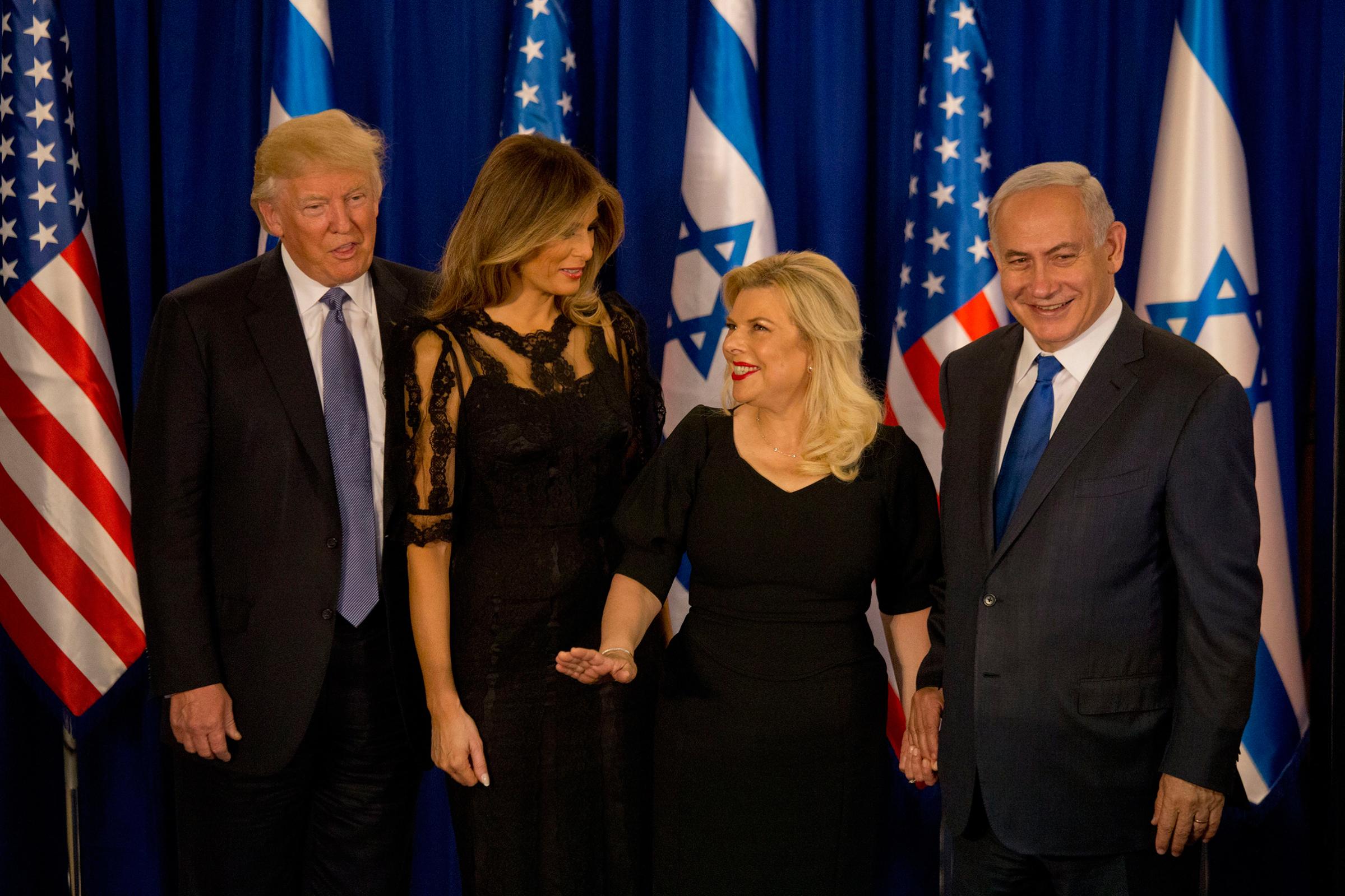 President Donald Trump and his wife Melania wearing Dolce &amp; Gabbana, and Israeli Prime Minister Benjamin Netanyahu and his wife Sara stand after their meeting in Jerusalem Israel, May 22, 2017.