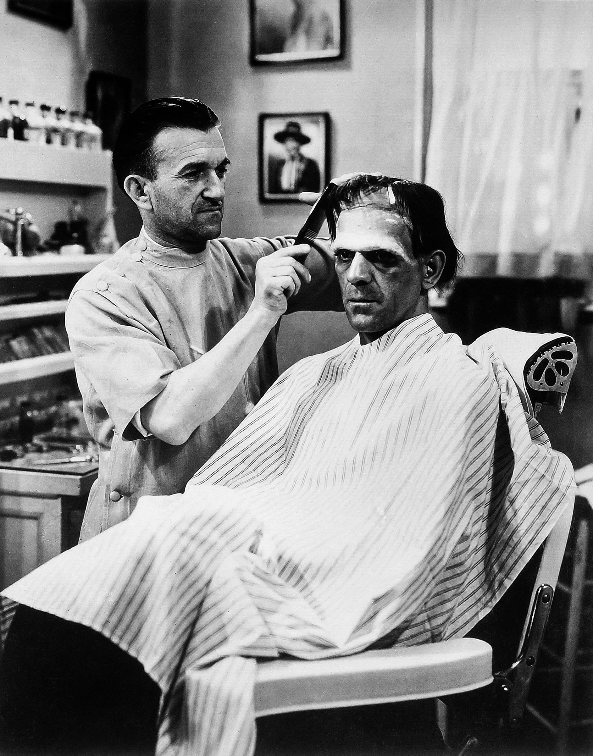 Makeup artist Jack Pierce combs the Monster’s wig: according to Boris Karloff, ‘it took from four to six hours a day to make me up . . .’ (1931).