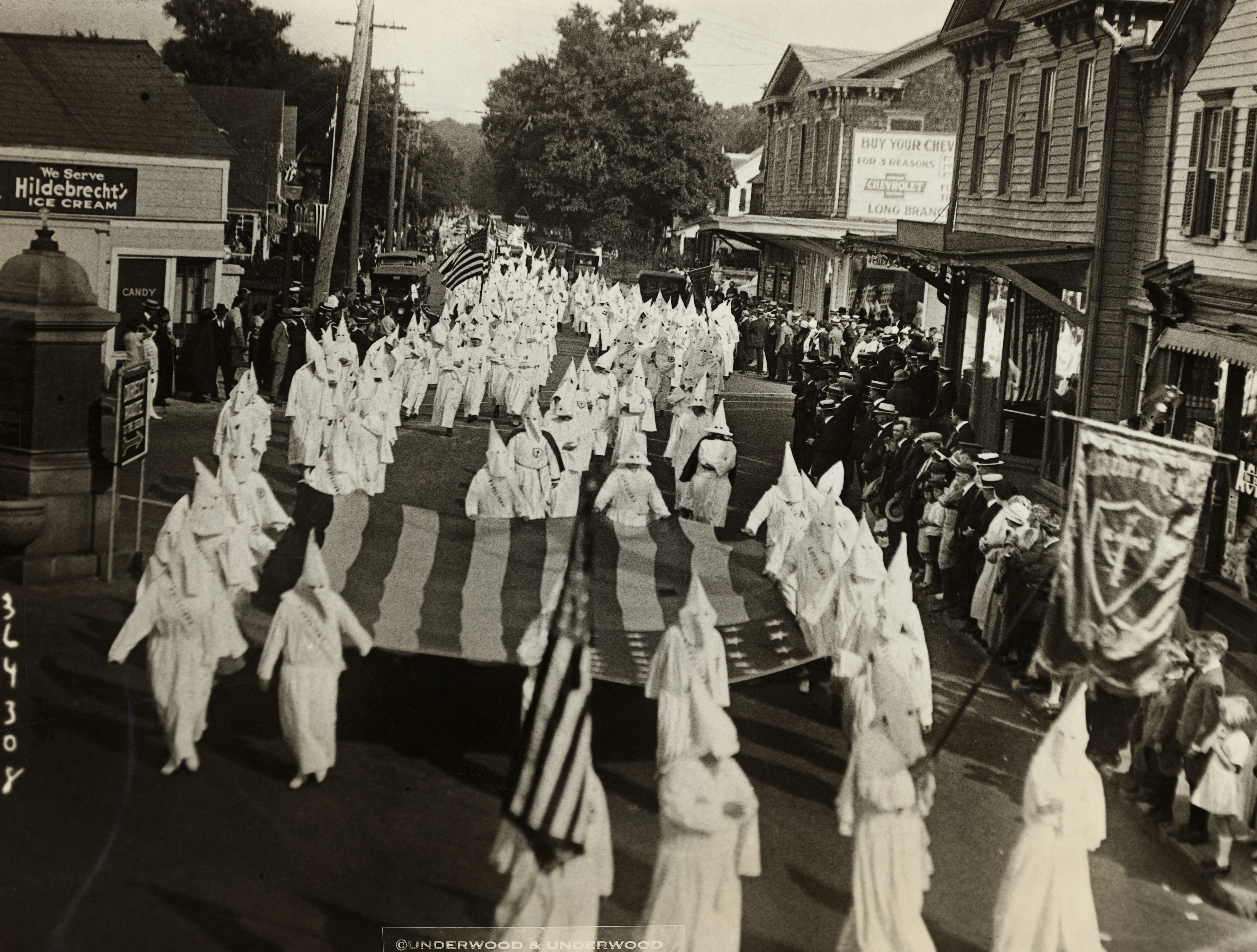 Klansmen march down Broadway in Long Branch, N.J. to celebrate its newly-established headquarters in the city. (George Rinhart/Corbis— Getty Images)