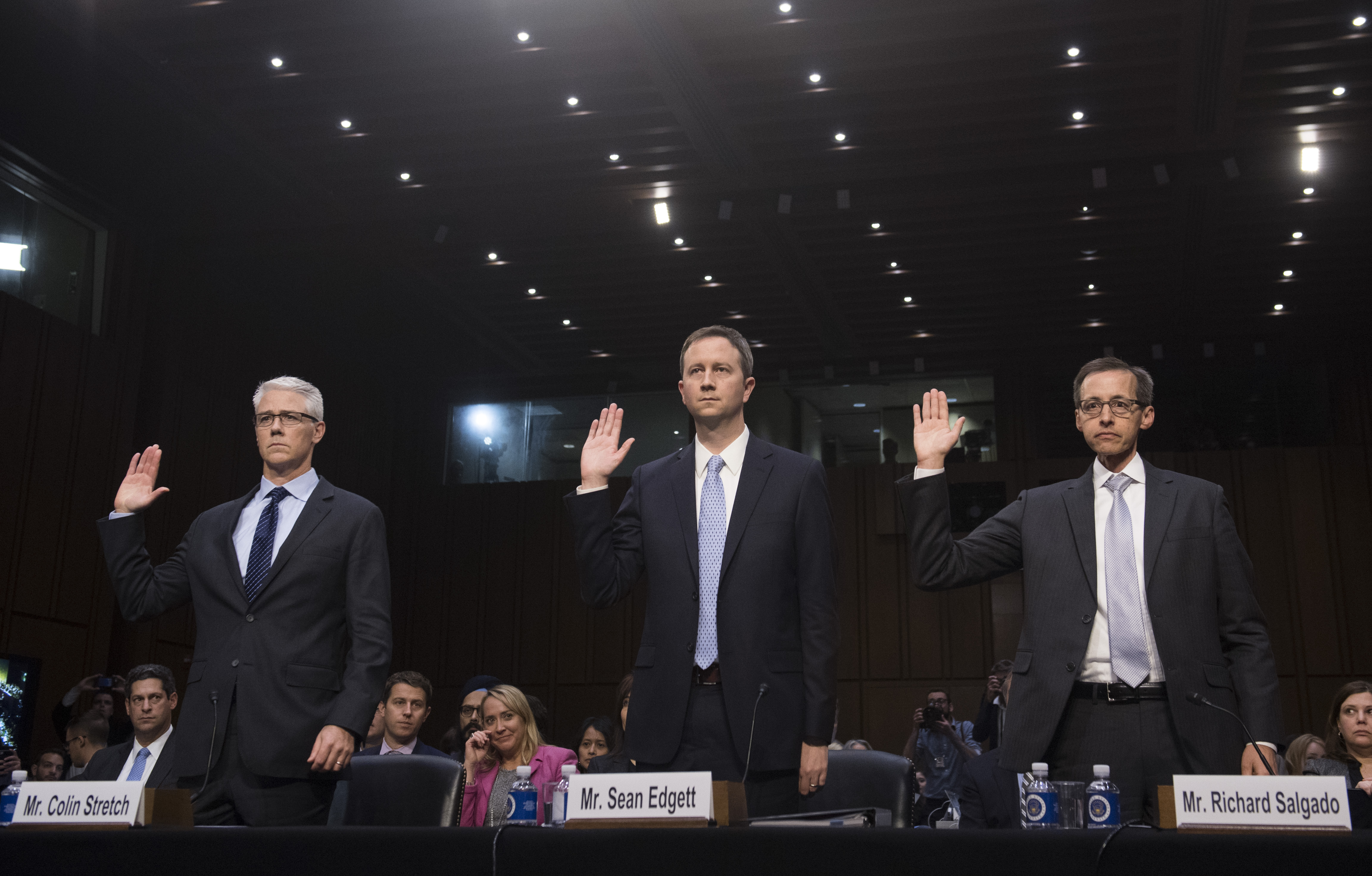 Colin Stretch (L), General Counsel of Facebook, Sean Edgett (C), Acting General Counsel of Twitter, and Richard Salgado (R), Director of Law Enforcement And Information Security of Google, are sworn in prior to testifying during a US Senate Judiciary Subcommittee on Crime and Terrorism hearing on Russian influence on social networks on Capitol Hill in Washington, DC, October 31, 2017. (Saul Loeb—AFP/Getty Images)