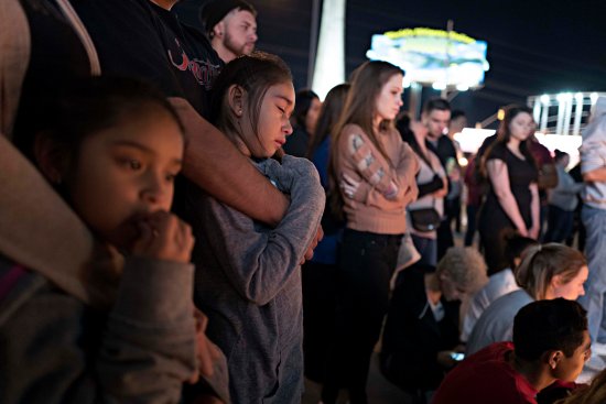 A street vigil held at Las Vegas Boulevard and Sahara Avenue, October 2, 2017.  photograph by Matt Stuart—Magnum for TIME