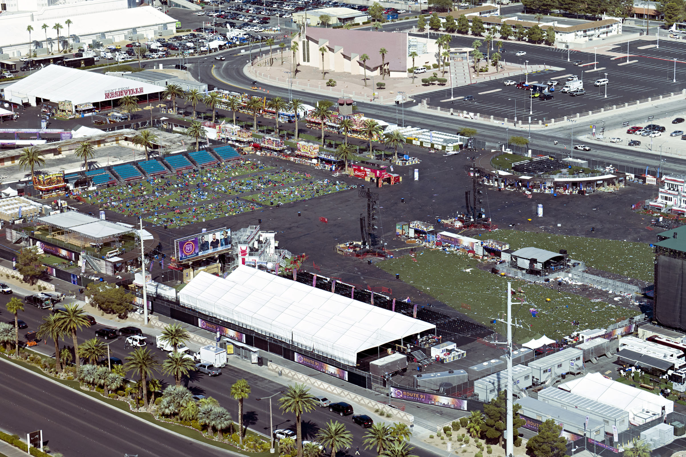 View of the festival grounds showing scattered belongings and chairs, left behind at the site of the mass shooting, Oct. 3, 2017.