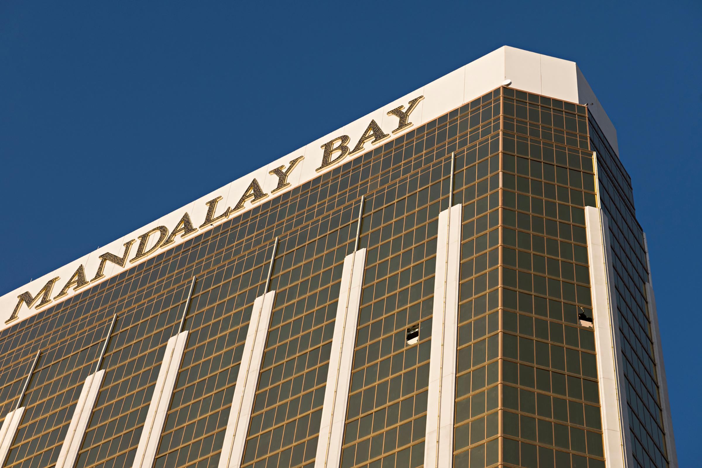 Broken windows on the 32nd floor of the Mandalay Bay Resort and Casino where a gunman opened fire on a concert crowd , Oct. 4, 2017.