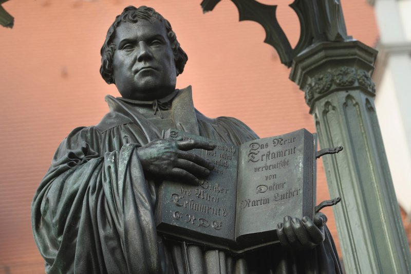 A statue of 16th-century theologian Martin Luther stands on Marktplatz square on Oct. 20, 2016 in Wittenberg, Germany.
