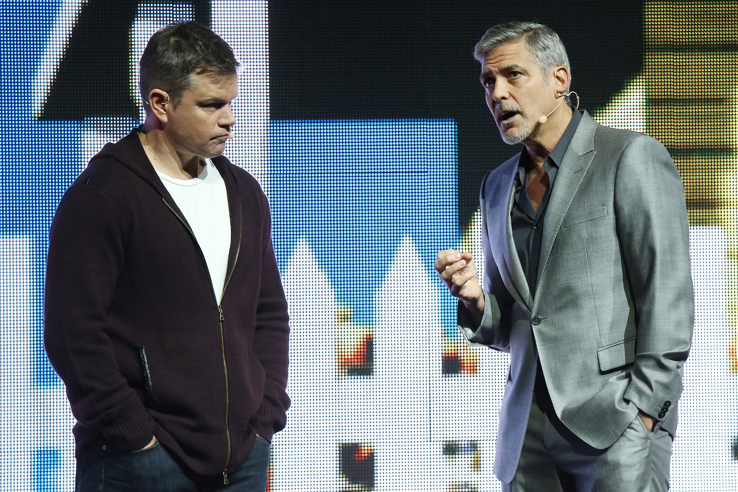 Matt Damon and George Clooney speak onstage at the Paramount Pictures' presentation, on March 28, 2017 in Las Vegas. (Michael Tran—FilmMagic/Getty Images)