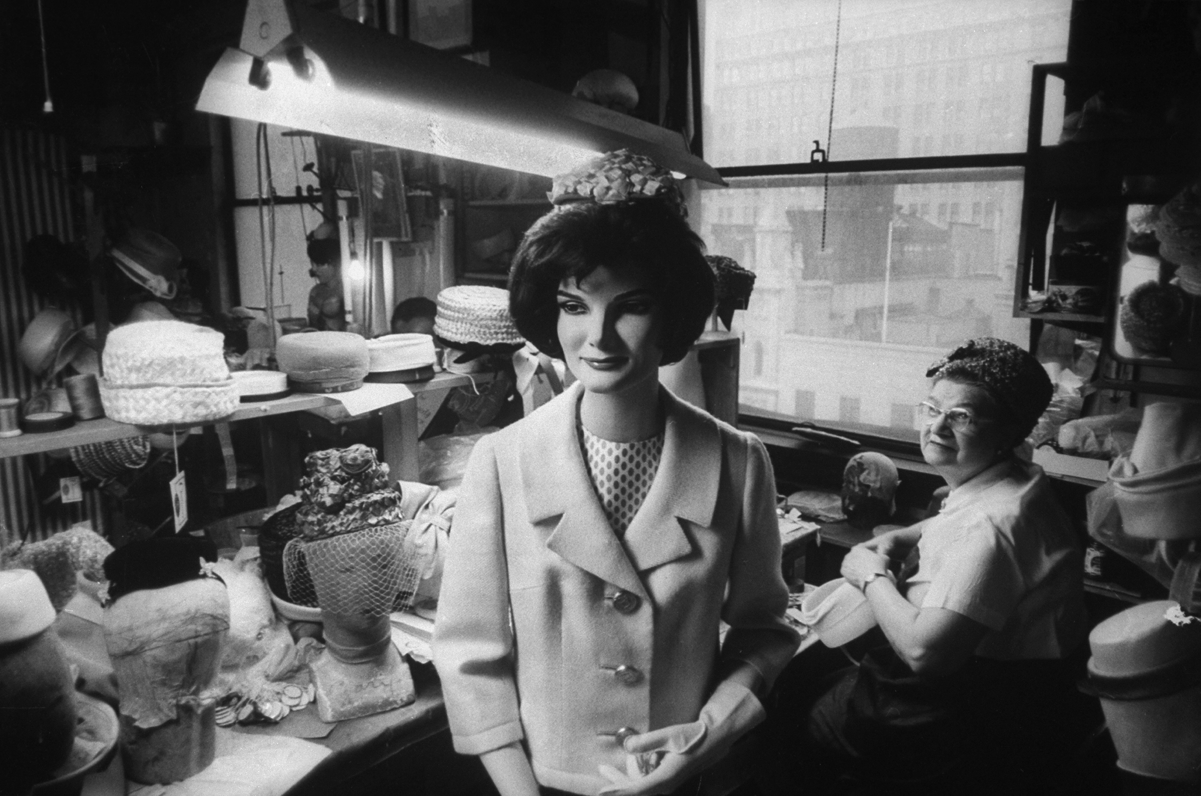 Mannequin of Jackie Kennedy, a standard size 10, stands at John Frederics shop in New York where pillbox hats sell for $35 to $70.