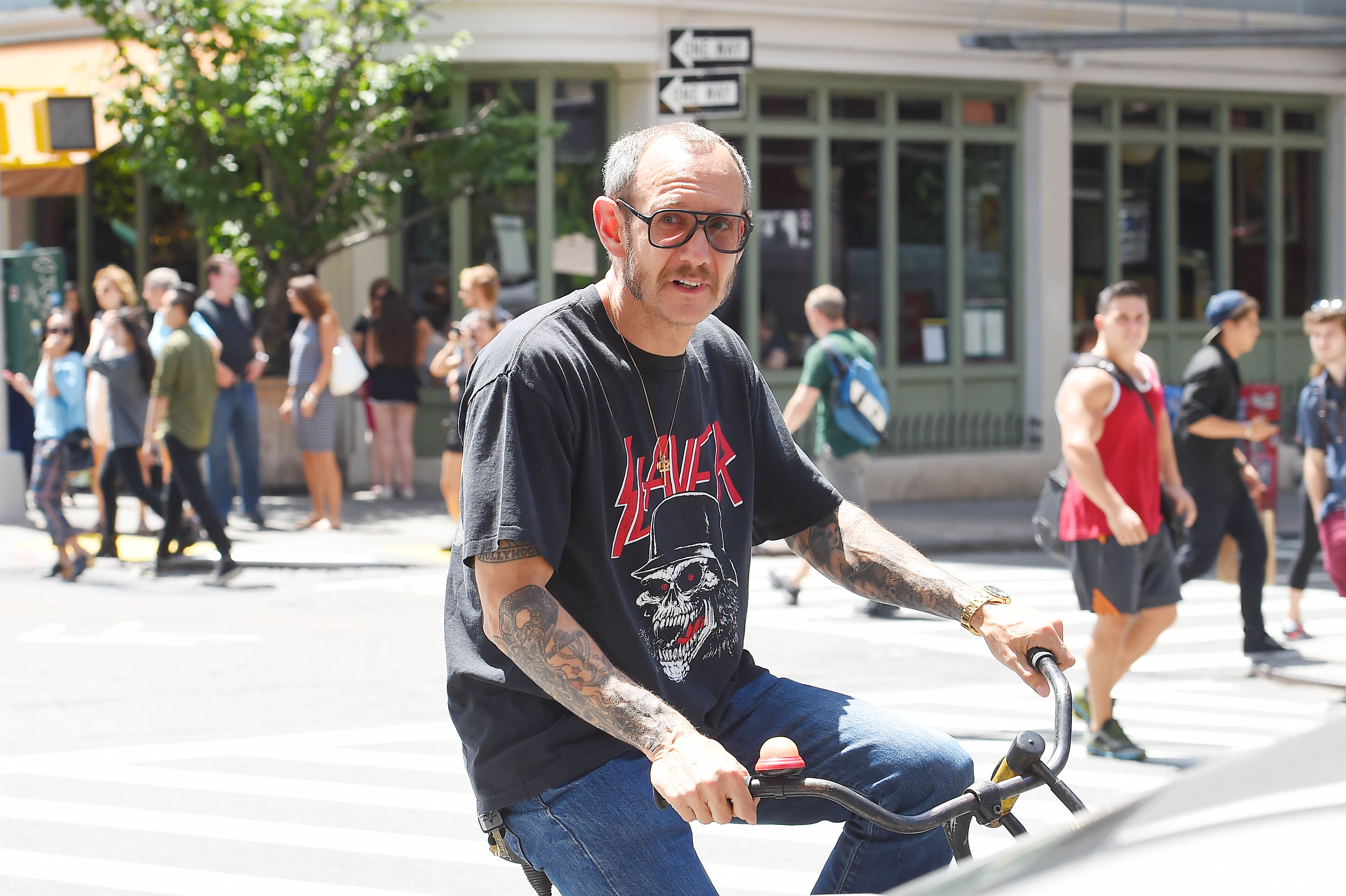 Terry Richardson seen out in Soho with his bike in New York City, on July 24, 2015. (Josiah Kamau—BuzzFoto/Getty Images)