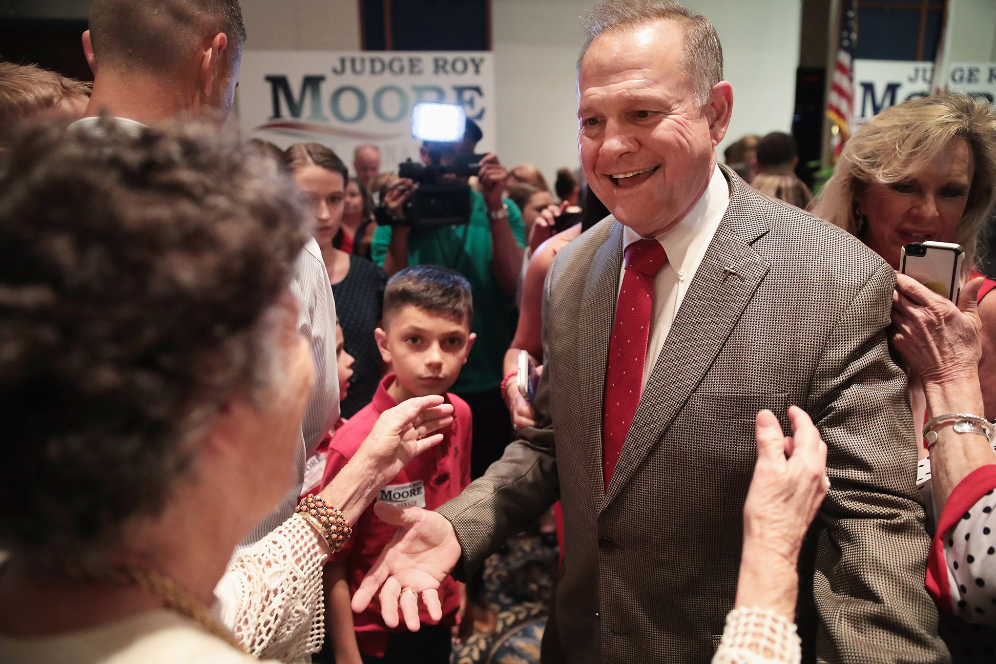 Moore greets supporters on Sept. 26 after winning the Republican primary in the special election for Alabama’s open Senate seat