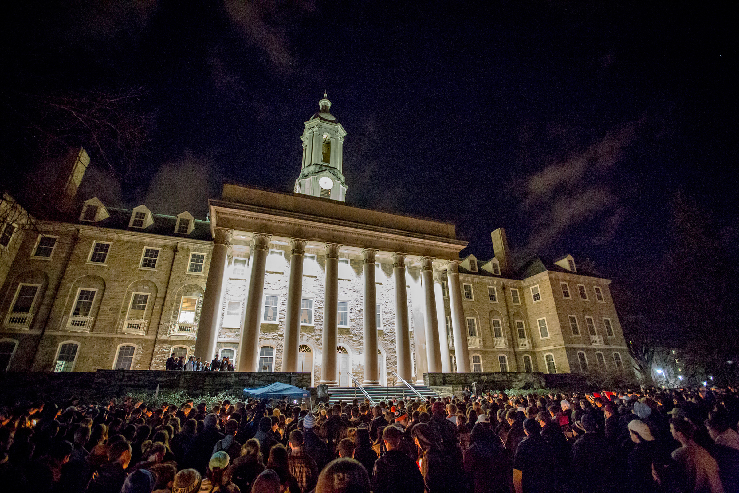 Students at Penn State gather for a candlelight vigil on Feb. 12, following Piazza’s death (Alex Yuan—The Daily Collegian)