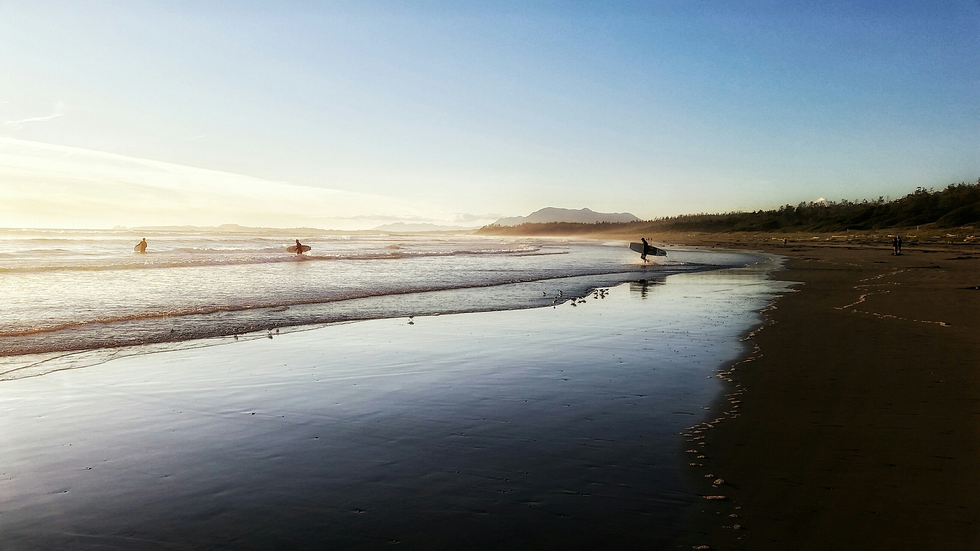 Scenic View Of Beach Against Sky At Tofino