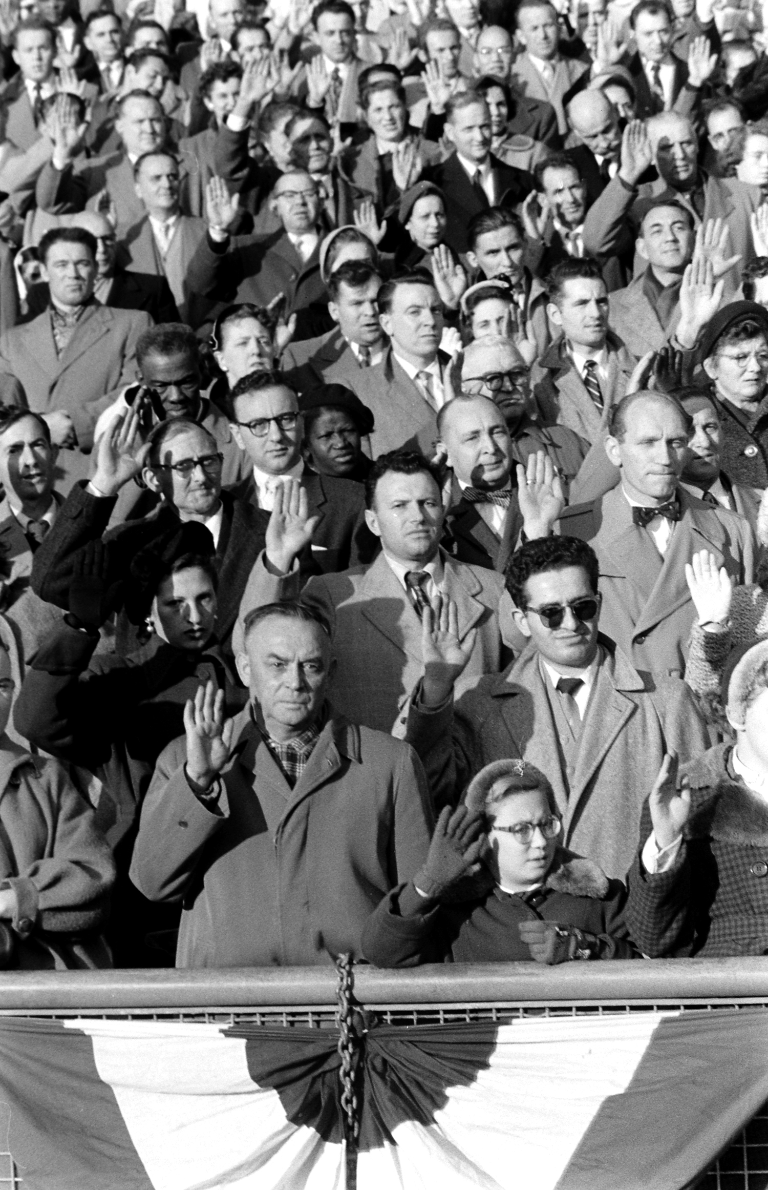 50,000 aliens become U.S. citizens on Veterans Day in 1954.