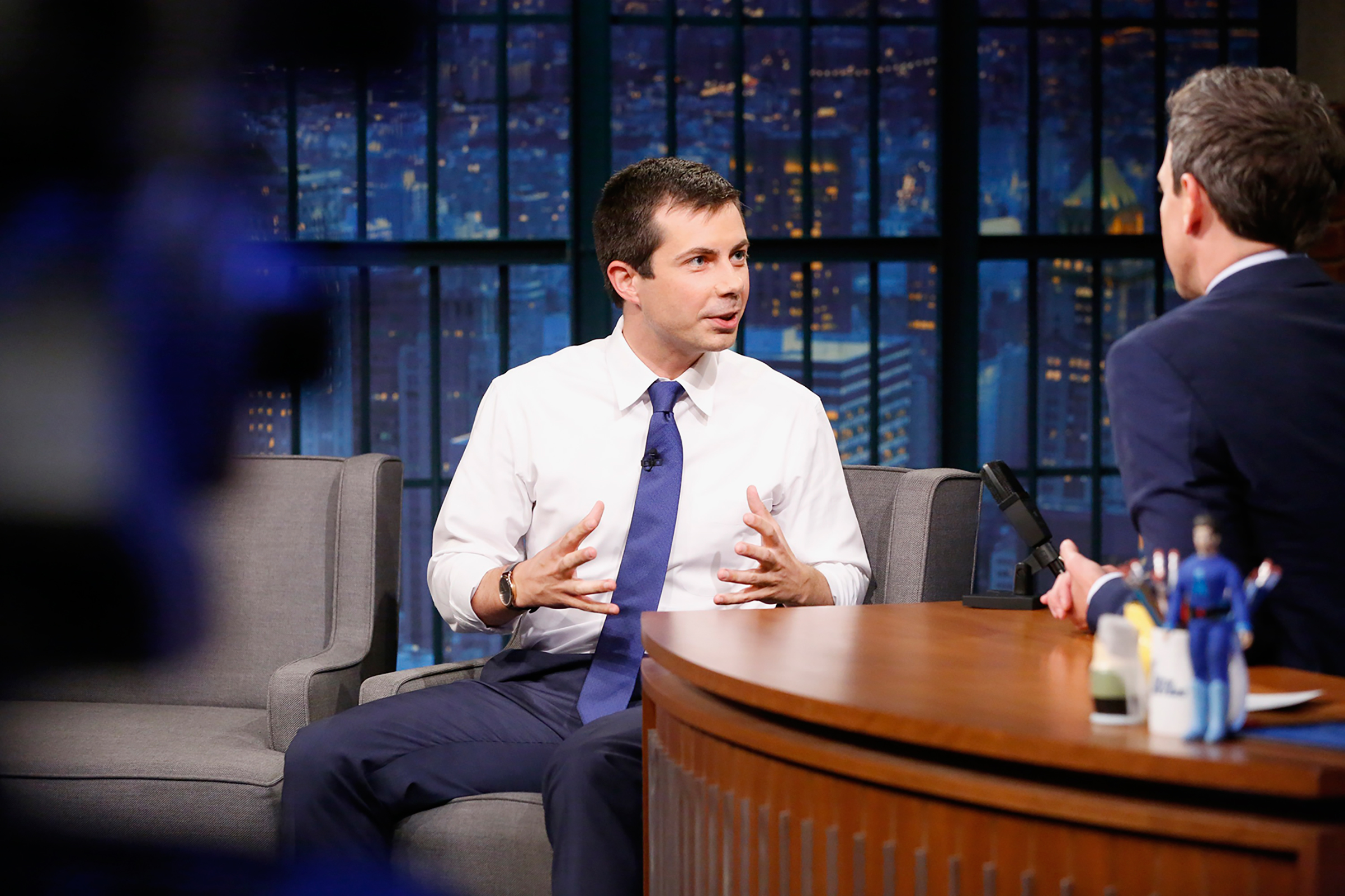 Pete Buttigieg - The 35-year-old, pictured here on Late Night with Seth Meyers, says his view of national security was shaped by serving in Afghanistan (Lloyd Bishop—NBC/NBCU/Getty Images)