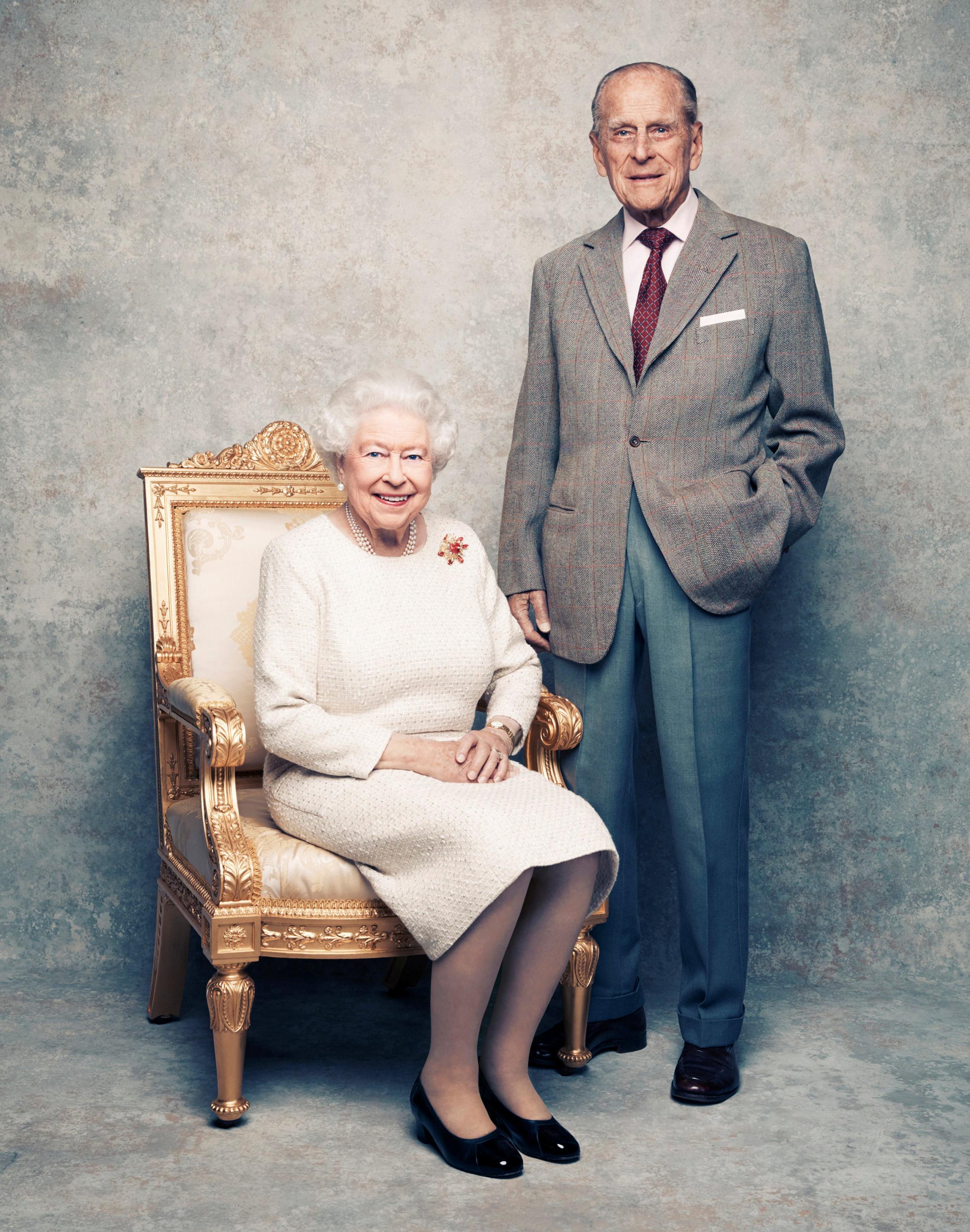 A handout photo shows Britain's Queen Elizabeth and Prince Philip in the White Drawing Room at Windsor Castle