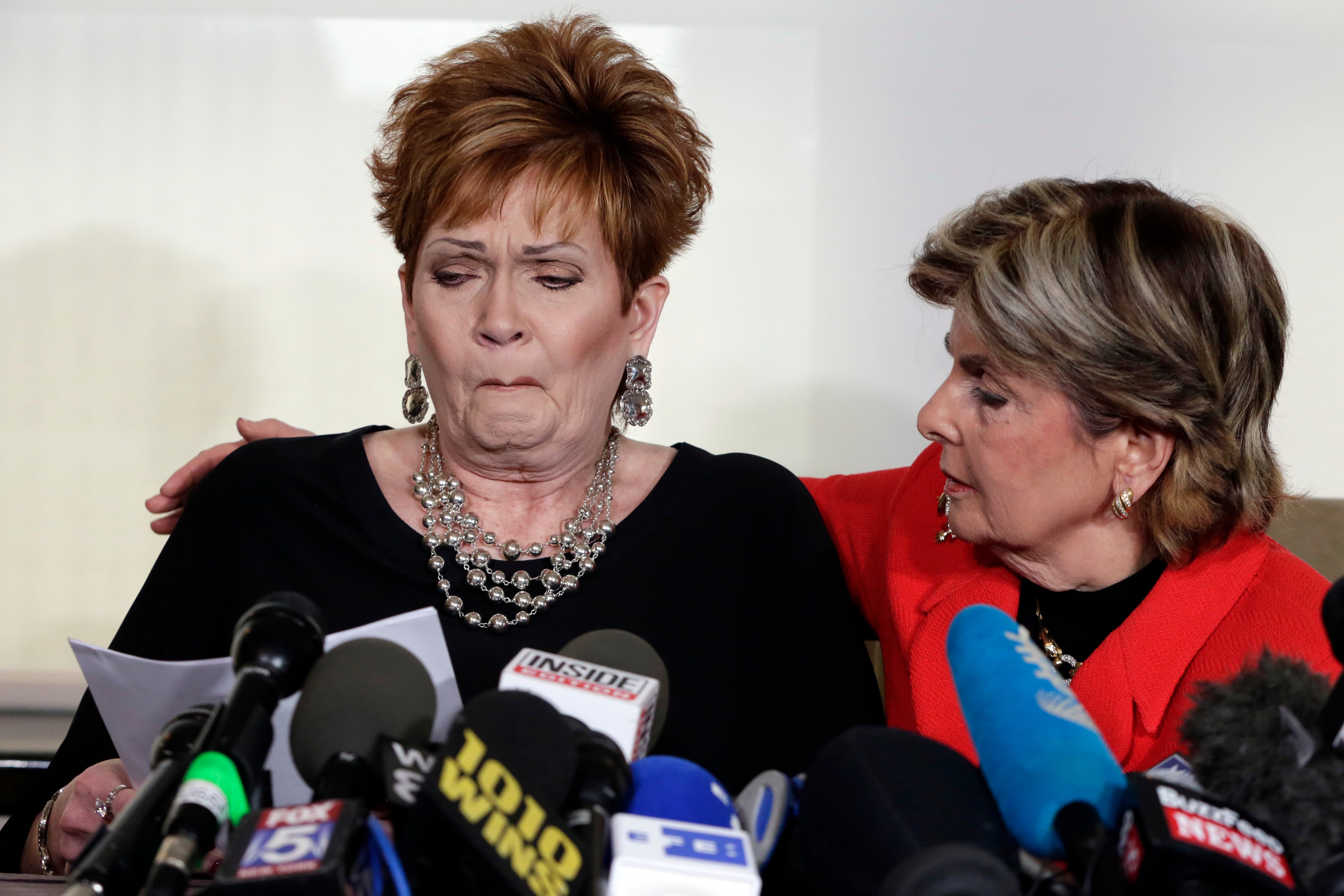 Beverly Young Nelson, left, the latest accuser of Alabama Republican Roy Moore, reads her statement as her attorney Gloria Allred looks on. (Richard Drew—AP)