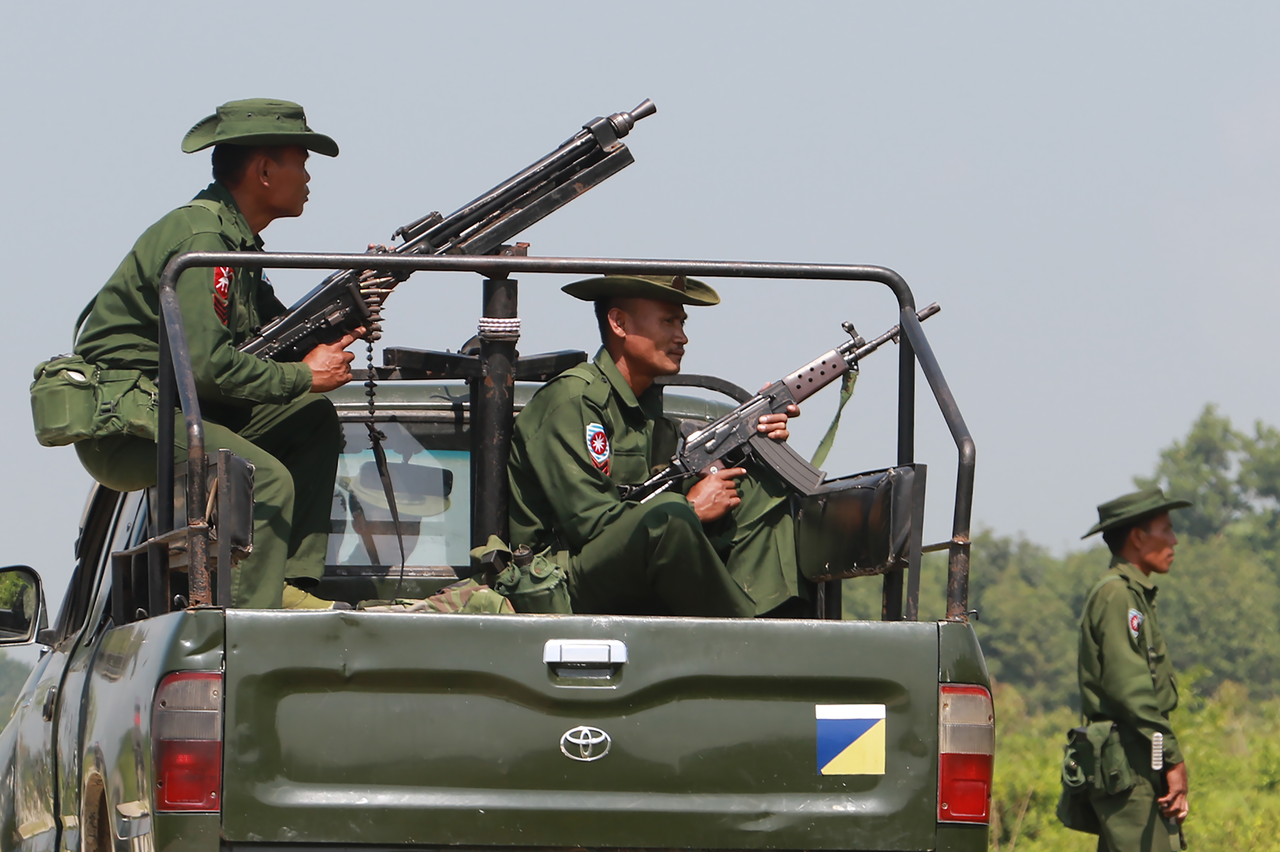 Heavily armed Myanmar army troops patrol in Maungdaw, Myanmar near the Bangladeshi border on Oct. 16, 2016. (Khine Htoo Mrat—AFP/Getty Images)