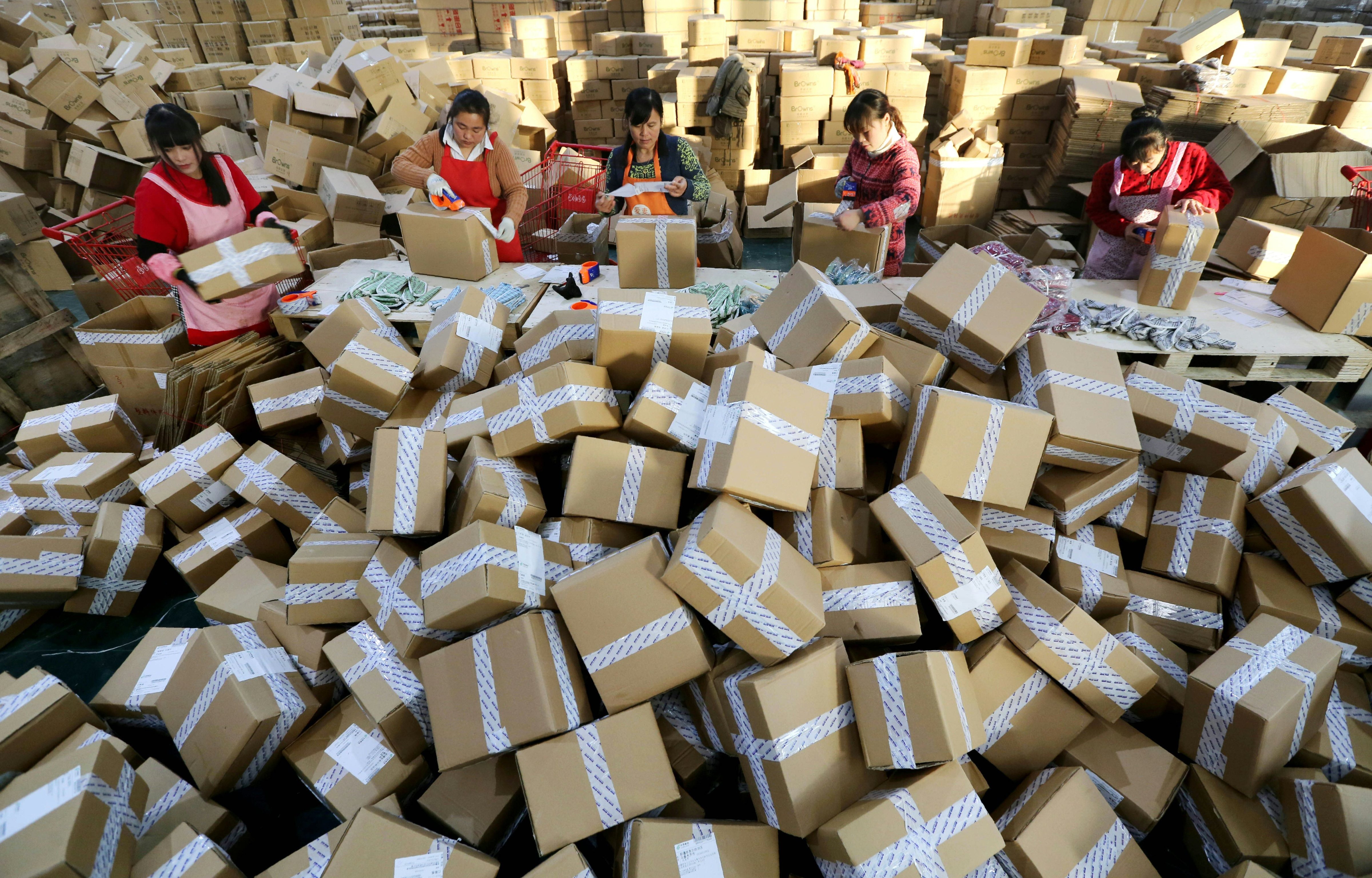 Workers prepare packages for delivery at a sorting center in Lianyungang, Jiangsu for Singles Day on Nov. 11, 2016. (Stringer&mdash;AFP/Getty Images)