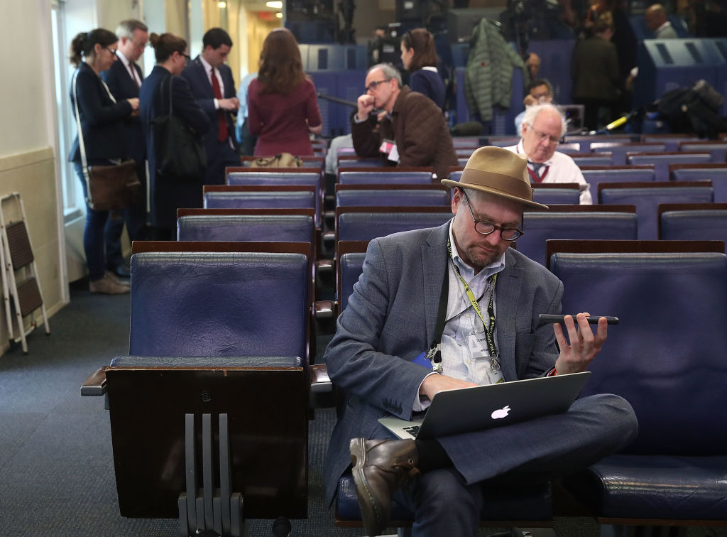 New York Times reporter Glenn Thrush works in the Brady Briefing Room after being excluded from a press gaggle by White House Press Secretary Sean Spicer, in Washington, DC, on Feb. 24, 2017. (Mark Wilson—Getty Images)
