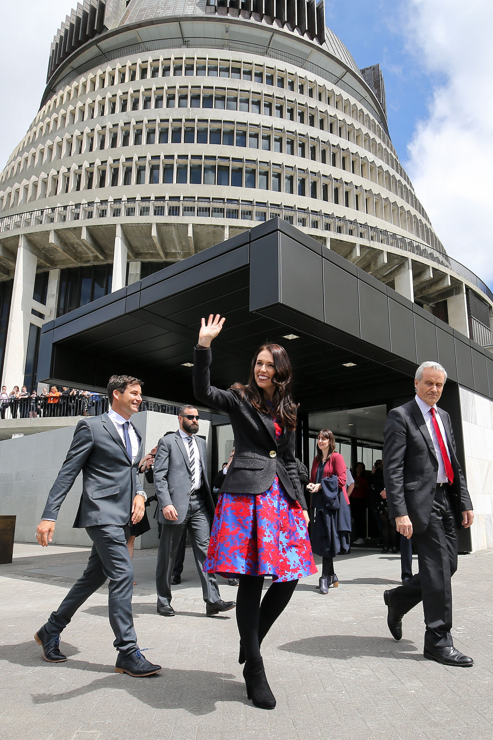 Prime Minister Jacinda Ardern and partner Clarke Gayford arrive at Parliament after a swearing-in ceremony at Government House in Wellington on Oct. 26, 2017. (Hagen Hopkins—Getty Images)