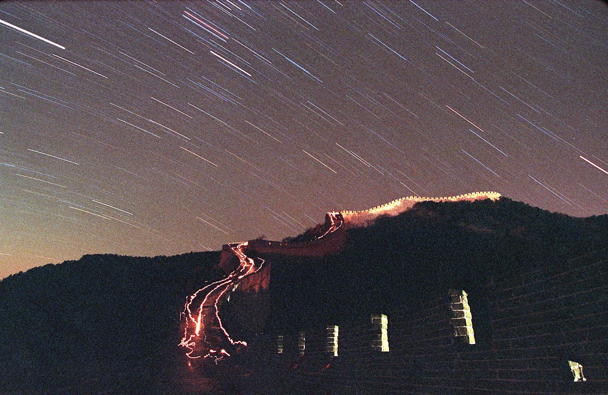The Leonid meteor shower lights up the sky above China's Great Wall (STEPHEN SHAVER&mdash;AFP/Getty Images)