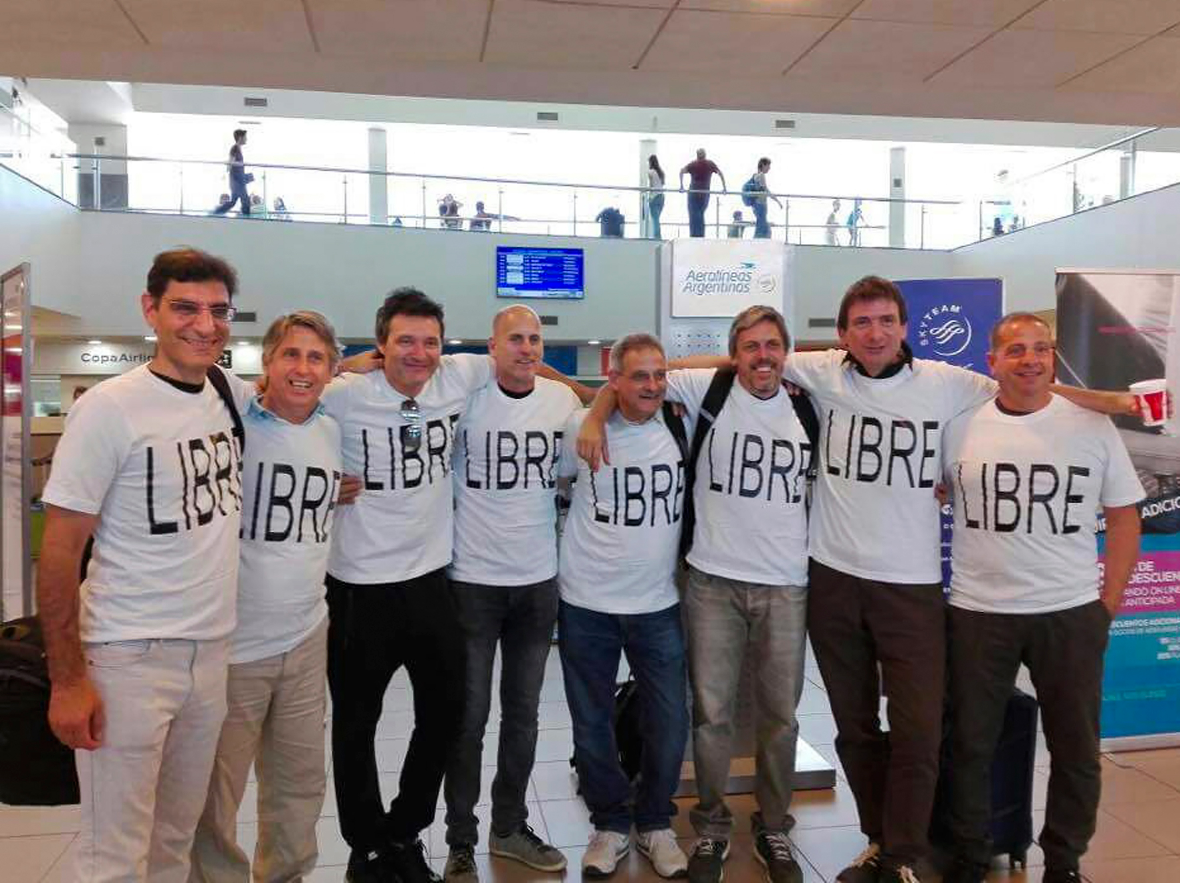 (From left) Hernan Ferruchi, Alejandro Pagnucco, Ariel Erlij, Ivan Brajckovic, Juan Pablo Trevisan, Hernan Mendoza, Diego Angelini and Ariel Benvenuto, gather for a group photo before their trip to New York City, at the airport in Rosario, Argentina, Oct. 28, 2017. Mendoza, Angelini, Pagnucco, Erlij and Ferruchi were killed in the terrorist attack in New York on Oct. 31. (Courtesy Trevisan family—AP)
