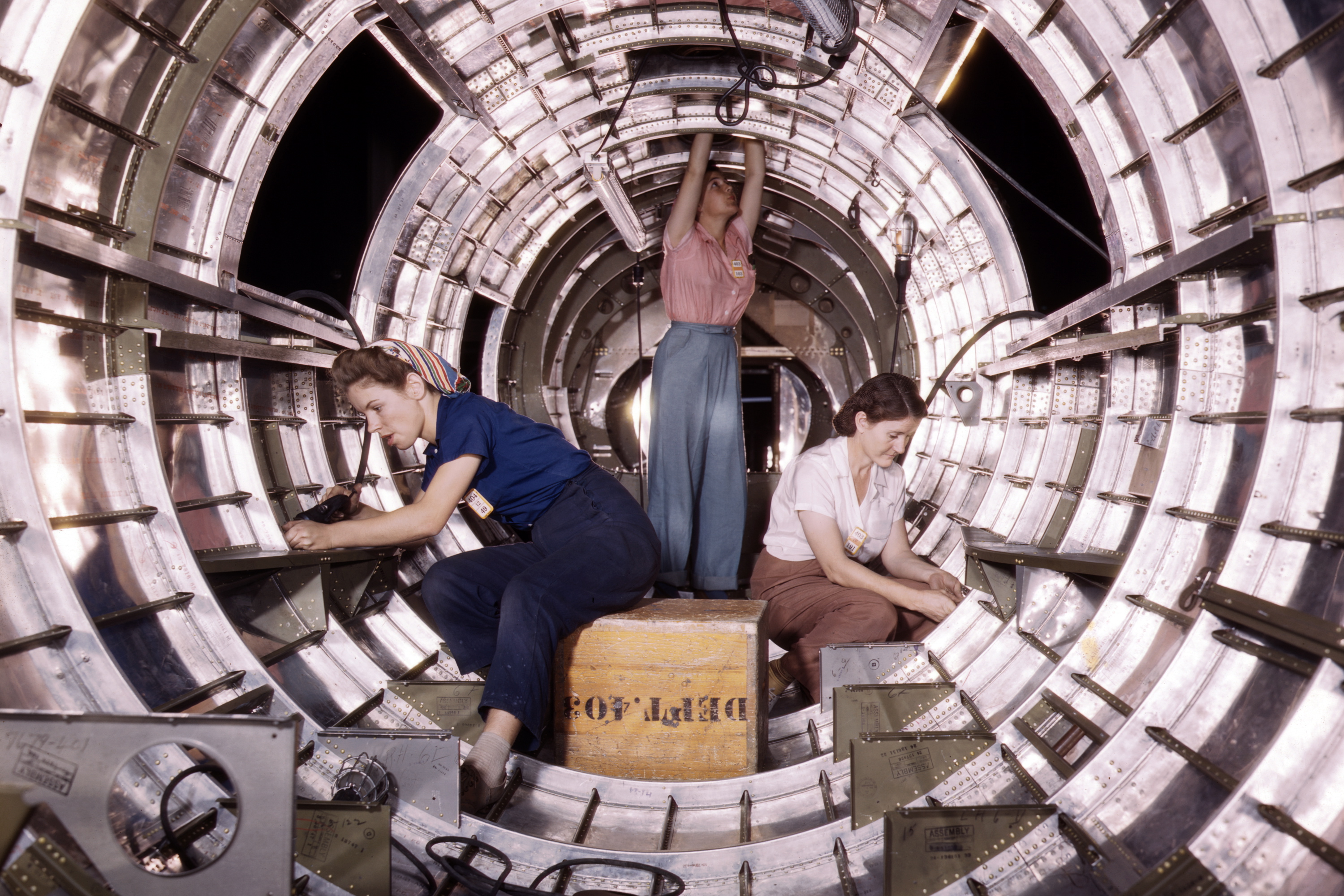 Women workers install fixtures and assemblies to a tail fuselage section of a B-17 bomber at the Douglas Aircraft Company plant, Long Beach, Calif. Better known as the "Flying Fortress," the B-17F is a later model of the B-17, which distinguished itself in action in the south Pacific, Germany and elsewhere. (Buyenlarge&mdash;Getty Images)