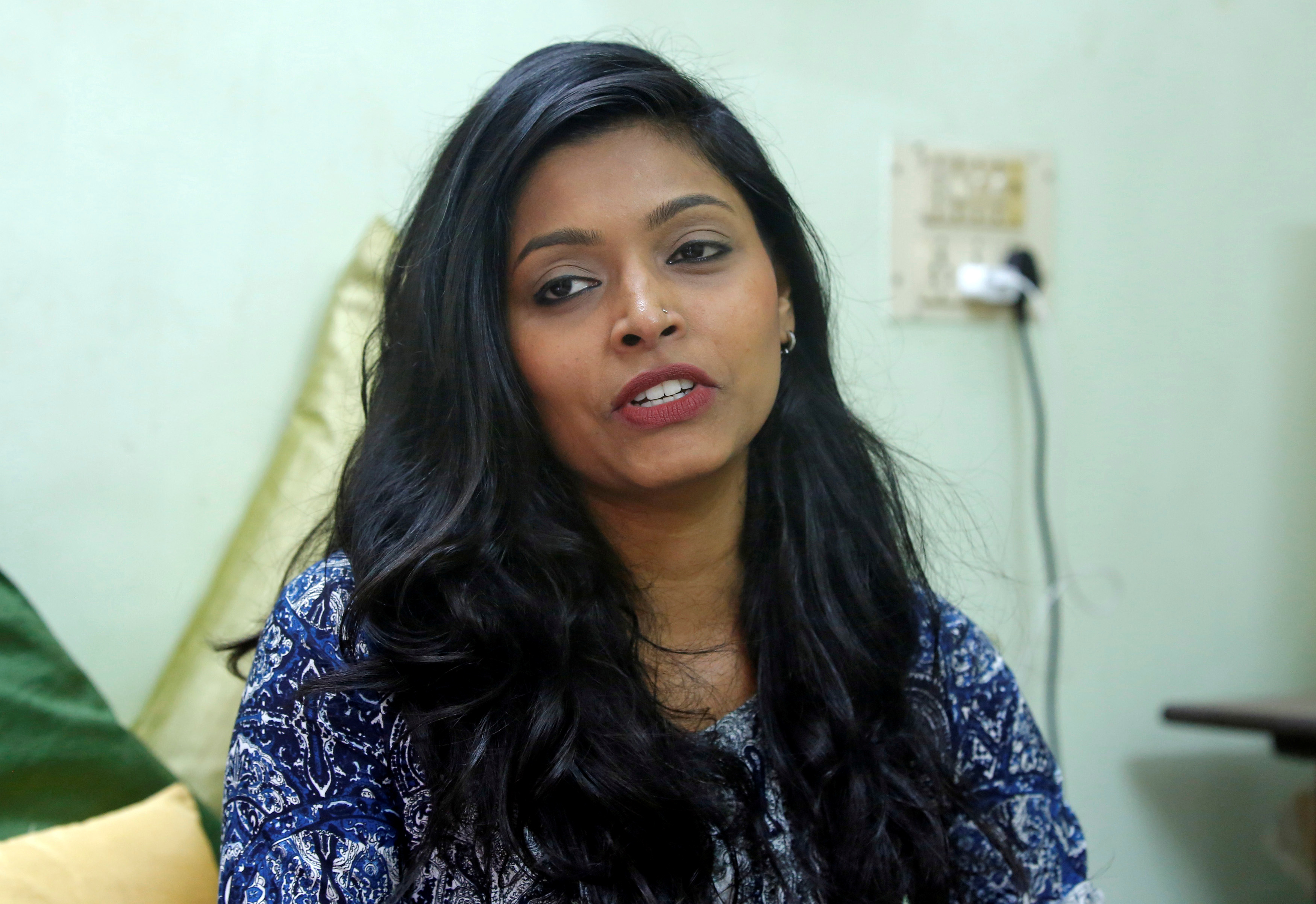 Actor Divya Unny speaks inside her residence in Mumbai