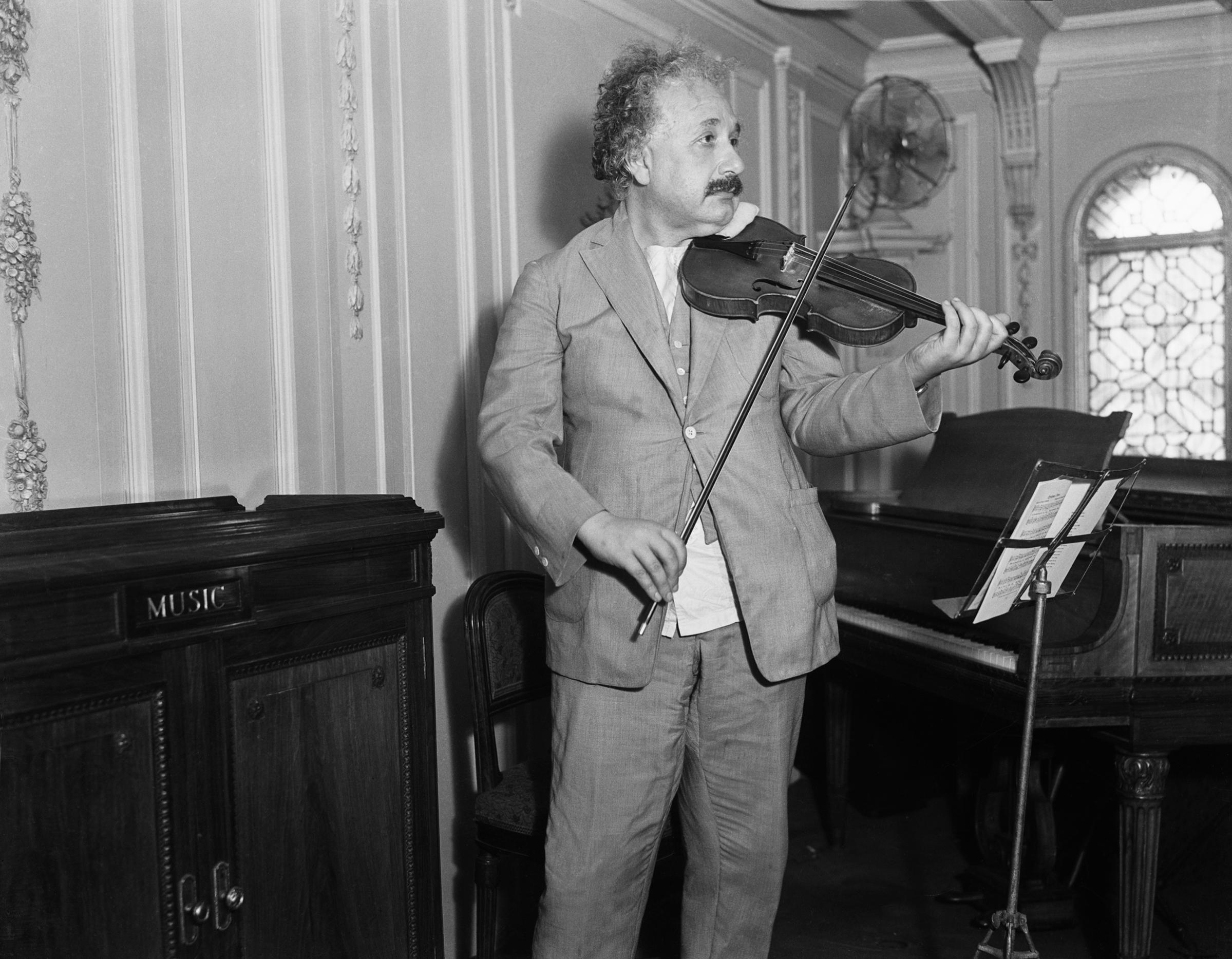 Professor Albert Einstein playing his violin in 1932.