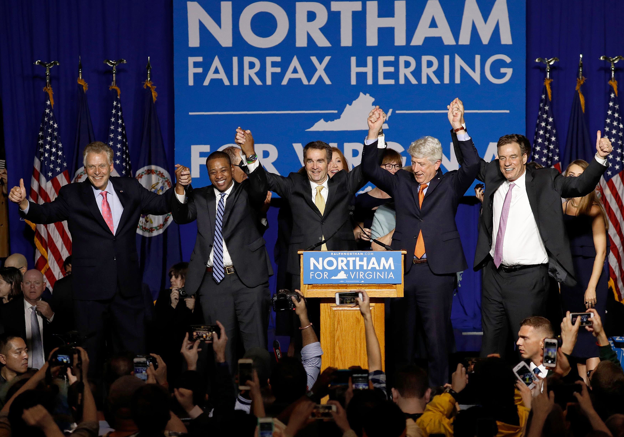 Virginian Ralph Northam celebrates his gubernatorial win with fellow Democrats on Nov. 7 (Aaron P. Bernstein—REUTERS)