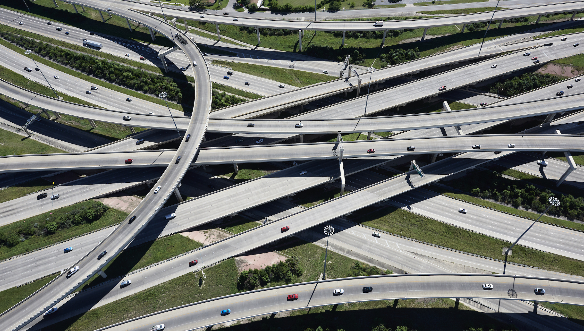 Cars drive on a highway interchange in San Antonio, Texas. (Cameron Davidson&mdash;Westend61/Getty Images)